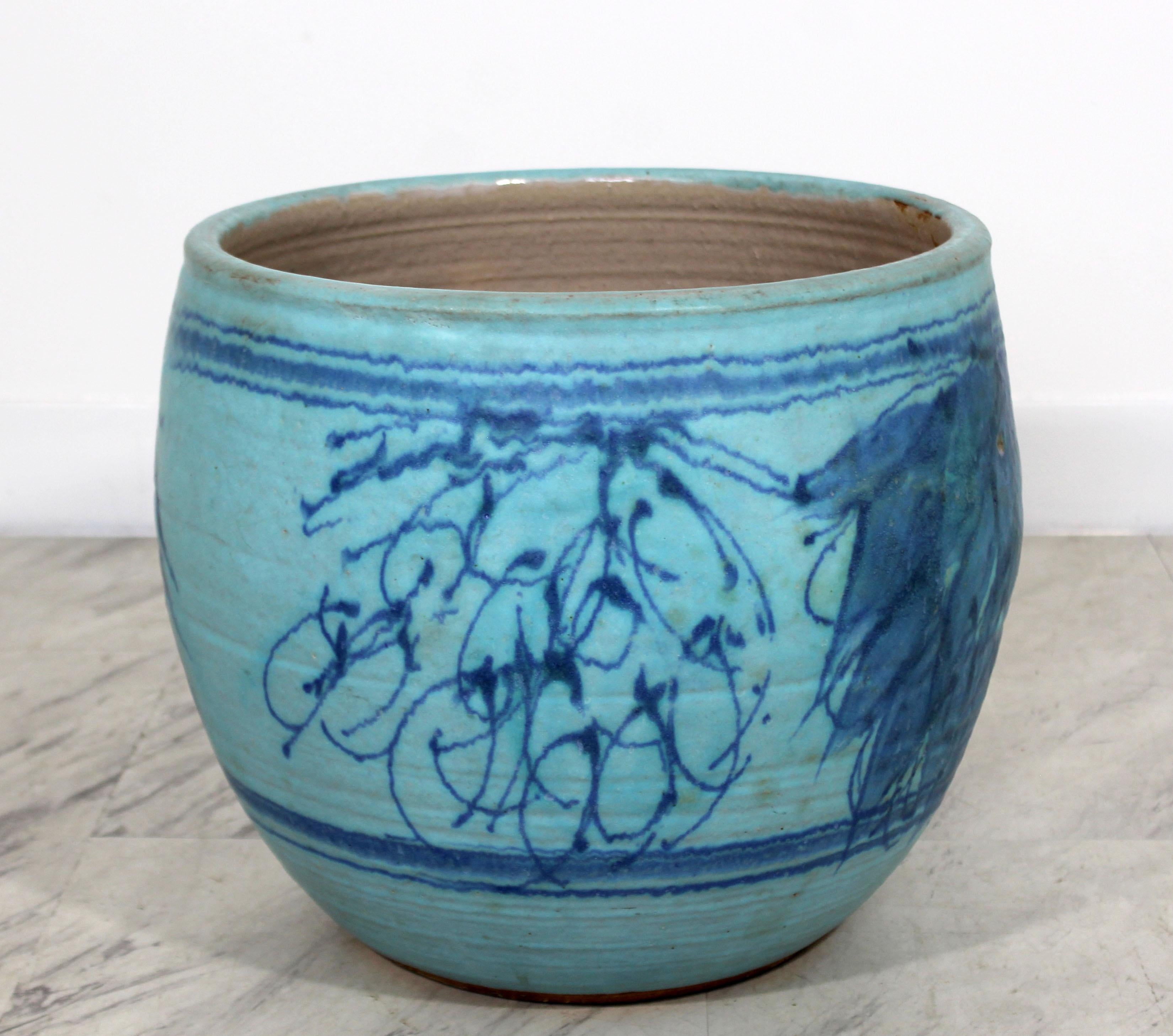 For your consideration is an rare exquisite, blue glazed ceramic pot, signed by J.T. Abernathy, circa the 1960s. Cranbrook Studio artist. In excellent condition. The dimensions are 14