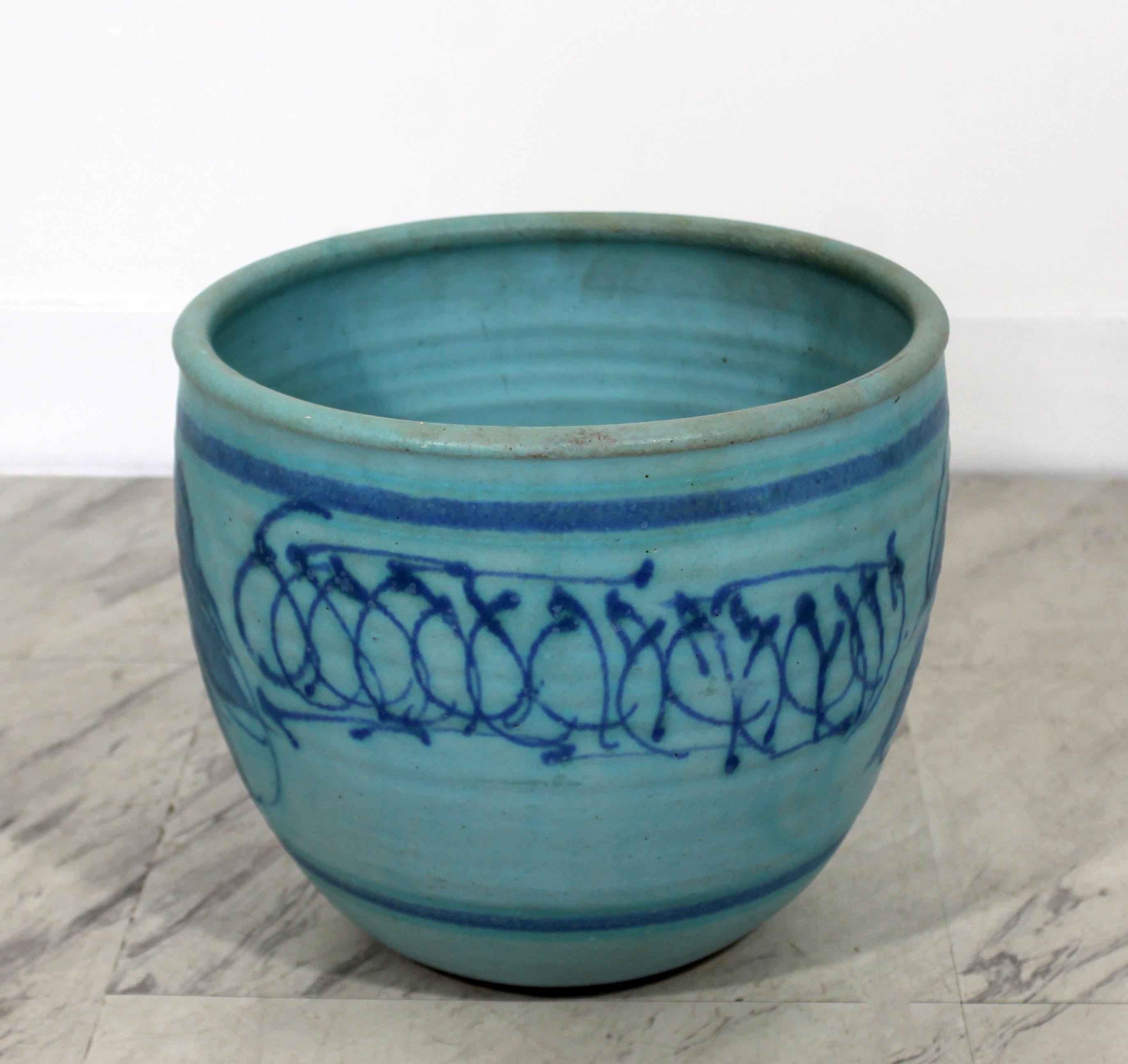 For your consideration is an rare exquisite, blue glazed ceramic pot, signed by J.T. Abernathy, circa 1960s. Cranbrook Studio artist. In excellent condition. The dimensions are 10.5