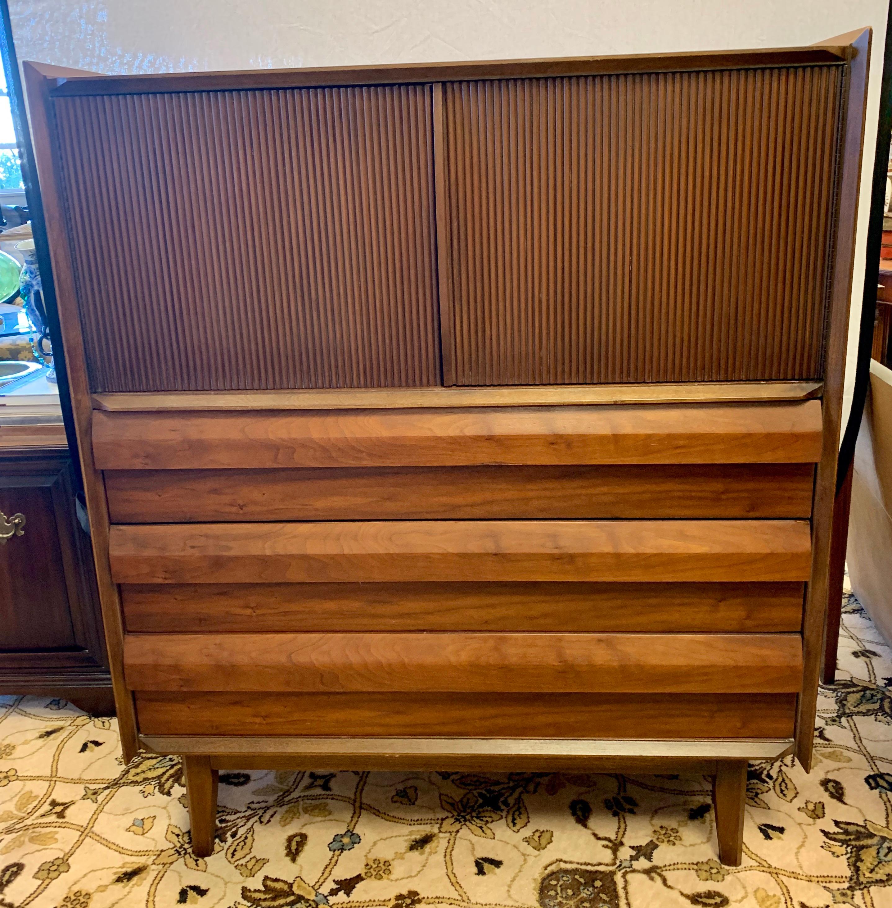 Stunning authentic Lane Altavista dresser or chest of drawers.
You will see this piece retail online for up to $4500.00 but not through RH. A truly iconic piece of midcentury, American made, furniture. What could be better? Features tambor doors at