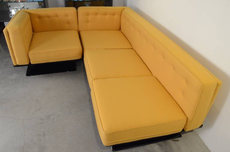 Offered is a signed Mid-Century Modern Italian MIM Roma or Ico Parisi by Luigi Pellegrin sectional sofa newly upholstered in a soft yellow wool Knoll fabric and newly refurbished black fiberglass base. The offered vintage MIM Roma sectional sofa by