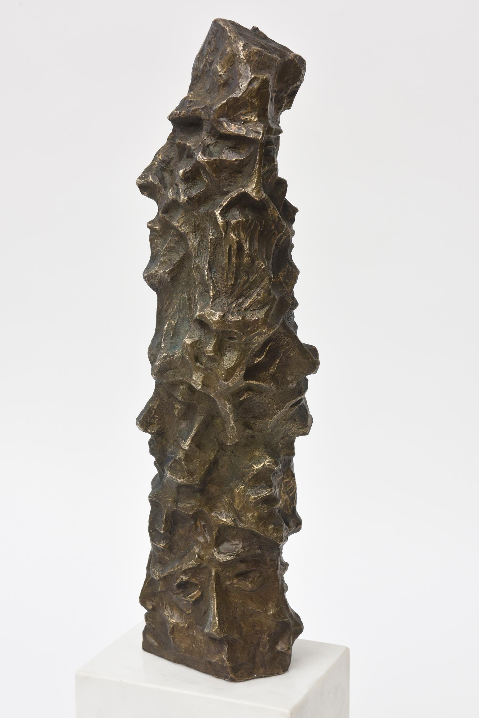 This arresting and visual bronze tipped and mixed metal column vintage sculpture is Mid-Century Modern. It is signed Mirtala. She is an internationally acclaimed Ukrainian born and American based sculptor that was born in 1929. It is signed in the