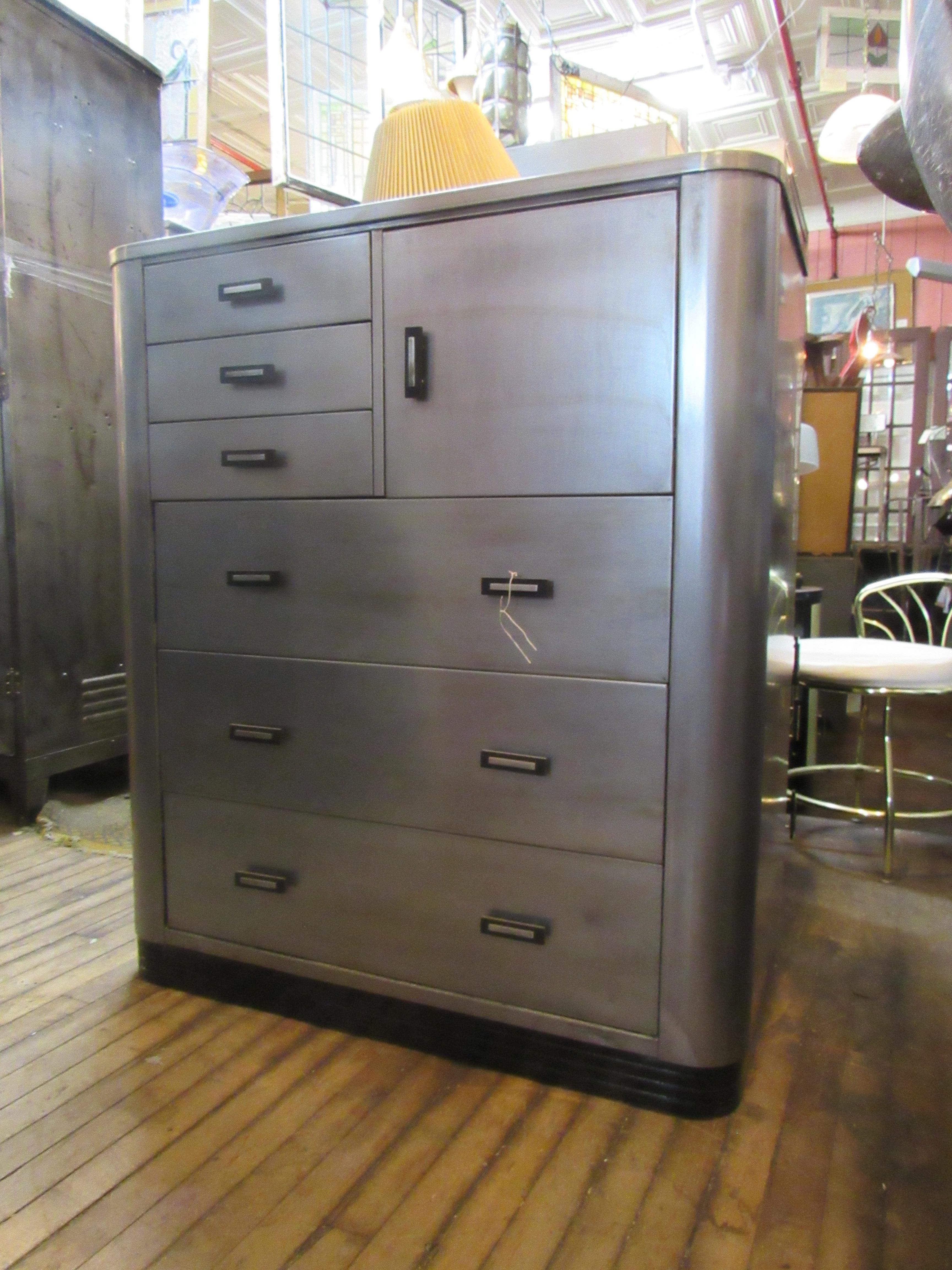 Large metal dresser by Simmons, full of unique style and understated design made complete by a brushed metal exterior. Please confirm item location with seller (NY/NJ).