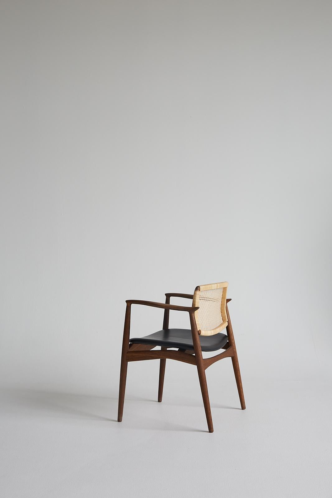 Danish Mid-Century modern SJ.67 Captain chair, cane, by Erik Buck. New edition For Sale