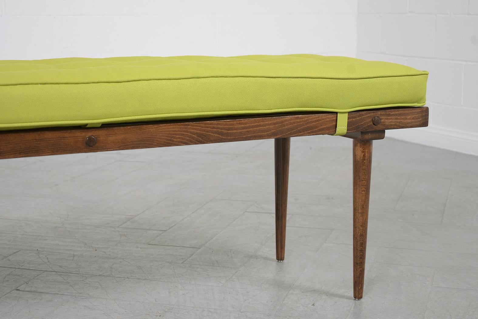 Restored Mid-Century Slatted Wood Bench with Green Vinyl Cushion In Good Condition For Sale In Los Angeles, CA
