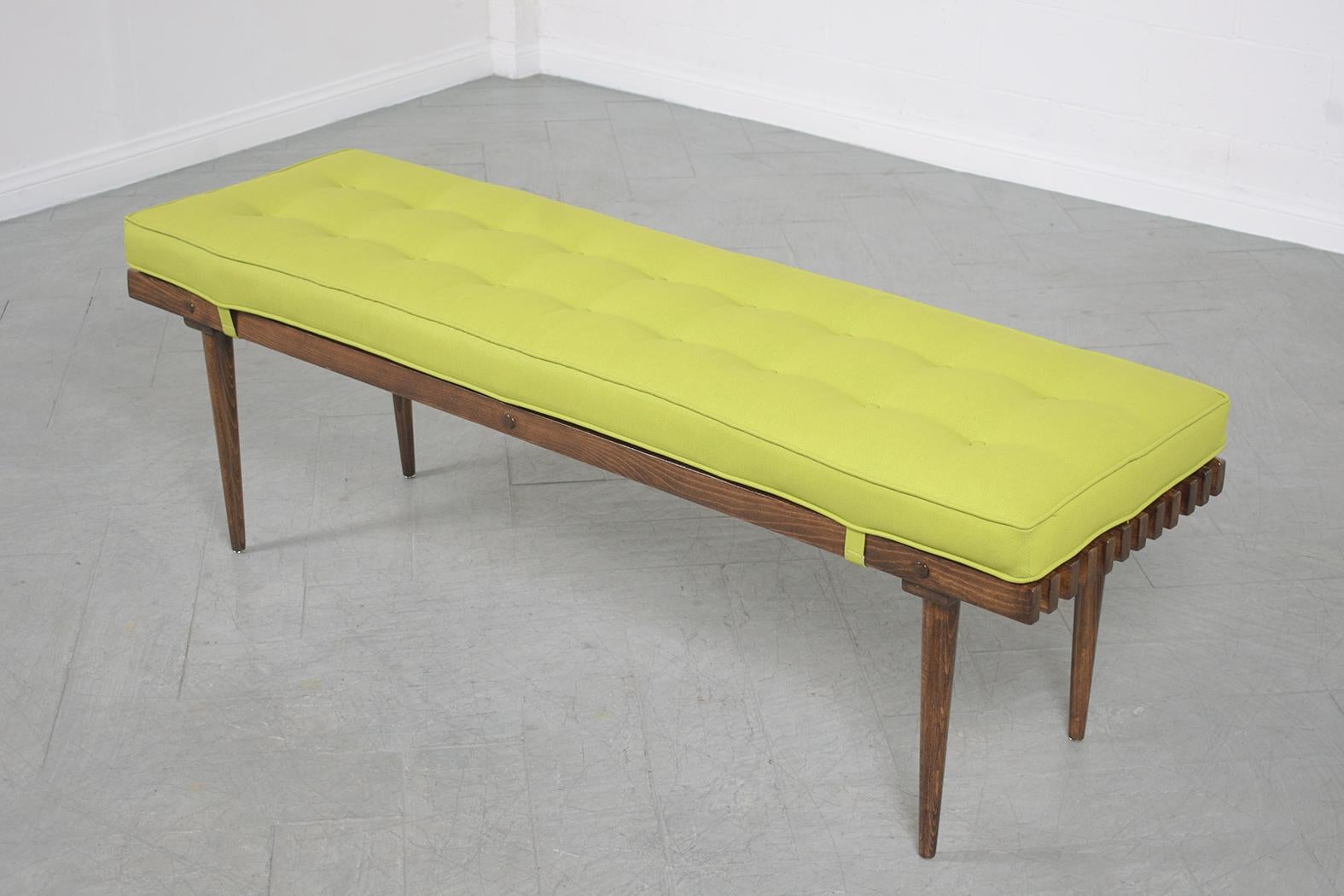 Mid-20th Century Restored Mid-Century Slatted Wood Bench with Green Vinyl Cushion For Sale