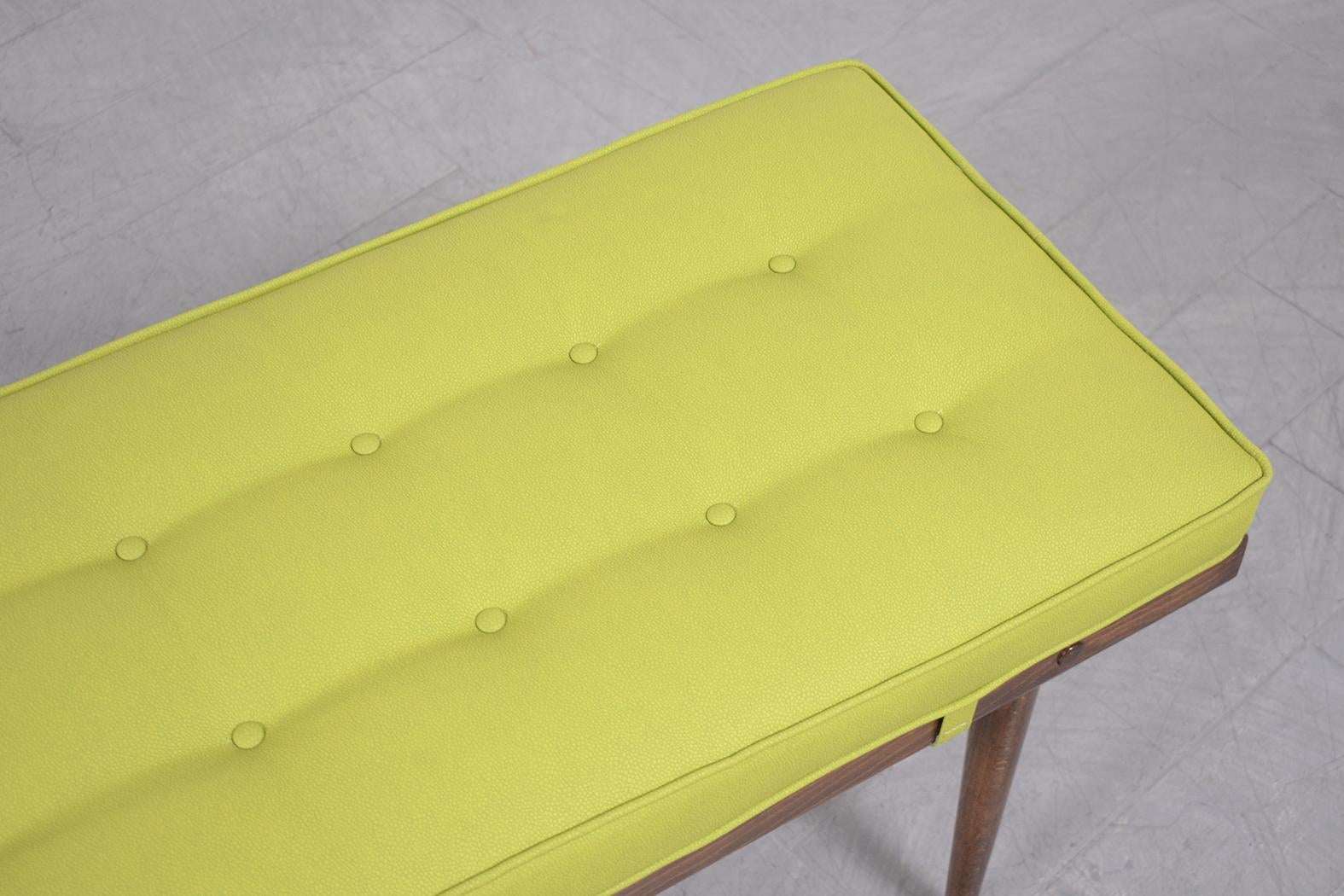 Mid-Century Modern Restored Mid-Century Slatted Wood Bench with Green Vinyl Cushion For Sale