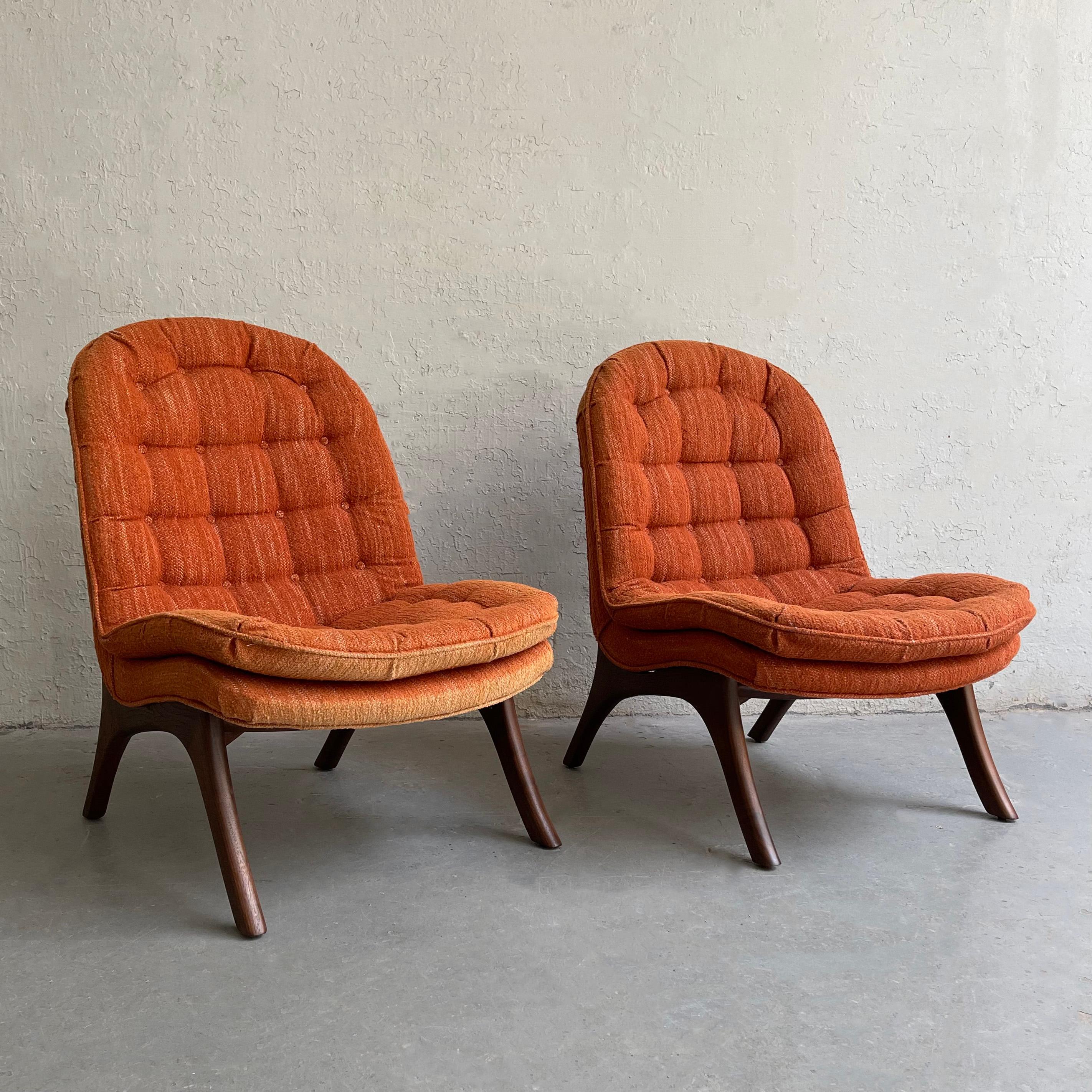Pair of fantastic, Mid-Century Modern, slipper, lounge chairs by Adrian Pearsall for Craft Associates features fully upholstered frames with attached tufted seats and backs in tangerine chenille with sculptural walnut legs. They are striking chairs