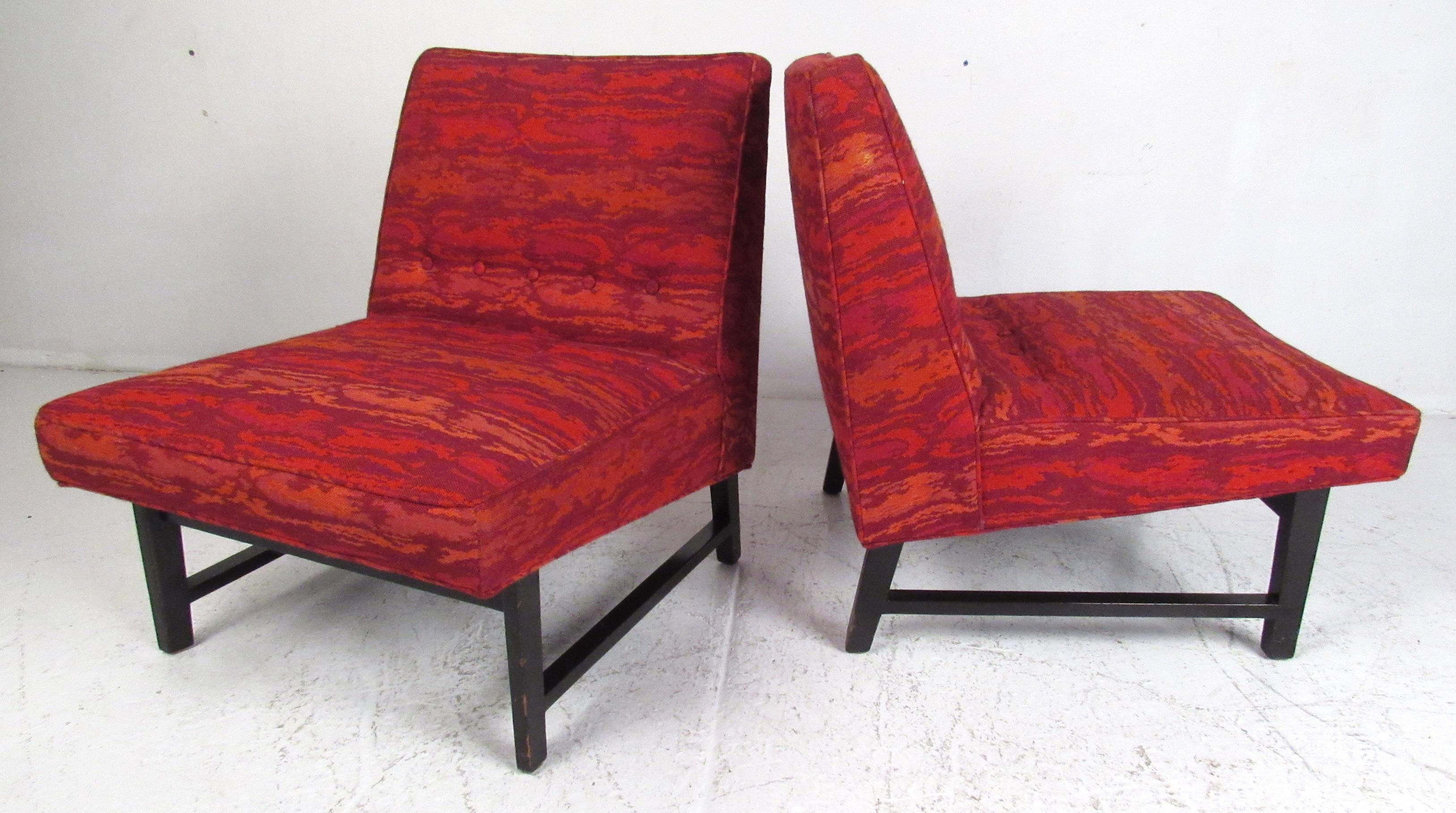 Pair of button-tufted slipper chairs on espresso colored frames with loose lumbar pillows designed by Edward Wormley for Dunbar Furniture Company. Please confirm item location (NY or NJ) with dealer.