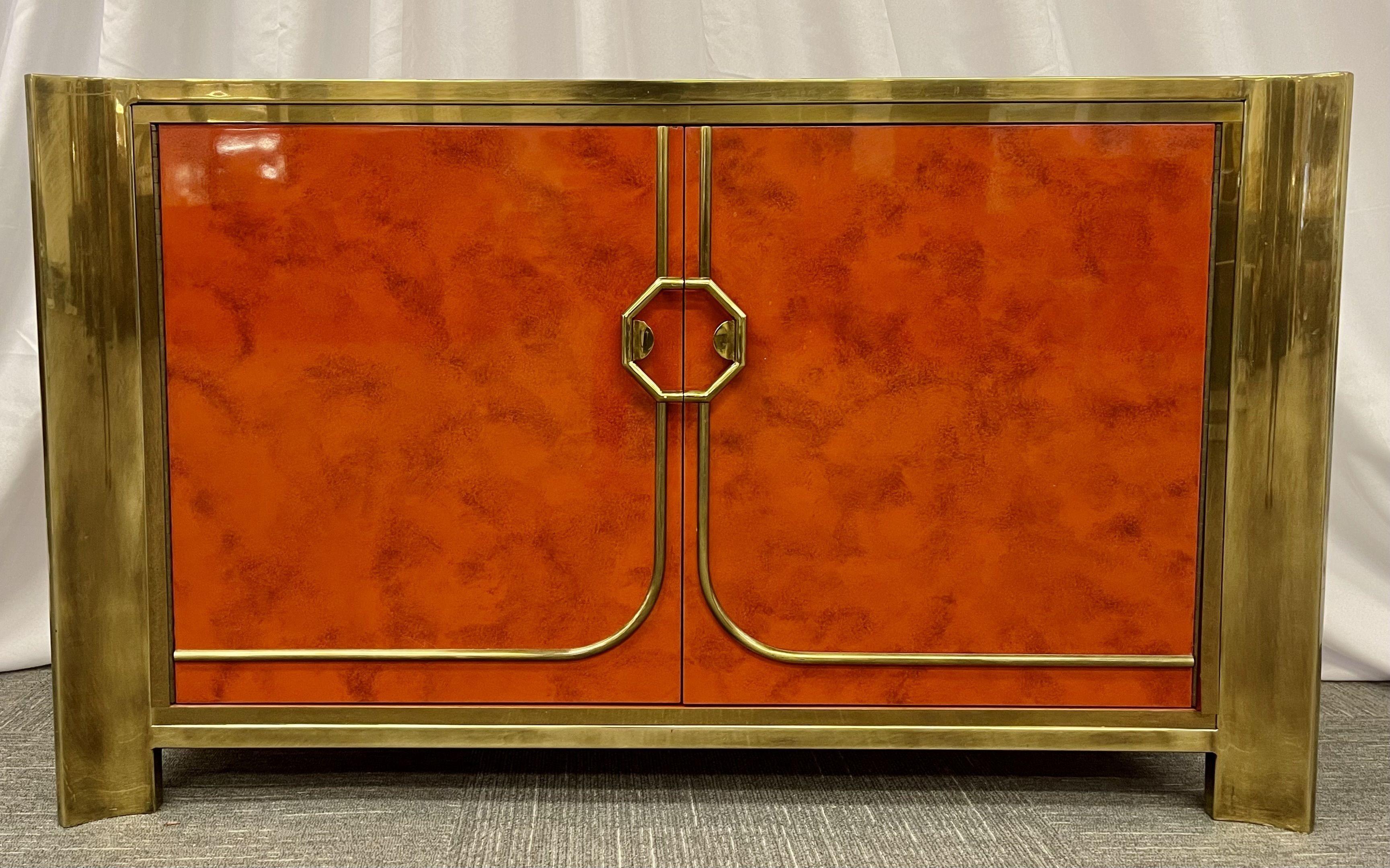 Mastercraft Patinated Brass and Tortoise Shell Style Lacquered Cabinet, Circa 1980s. two large doors and interior having a single adjustable shelf.
Patinated Brass, Lacquer
American, 1980s
Mastercraft: an established American furniture manufacturer