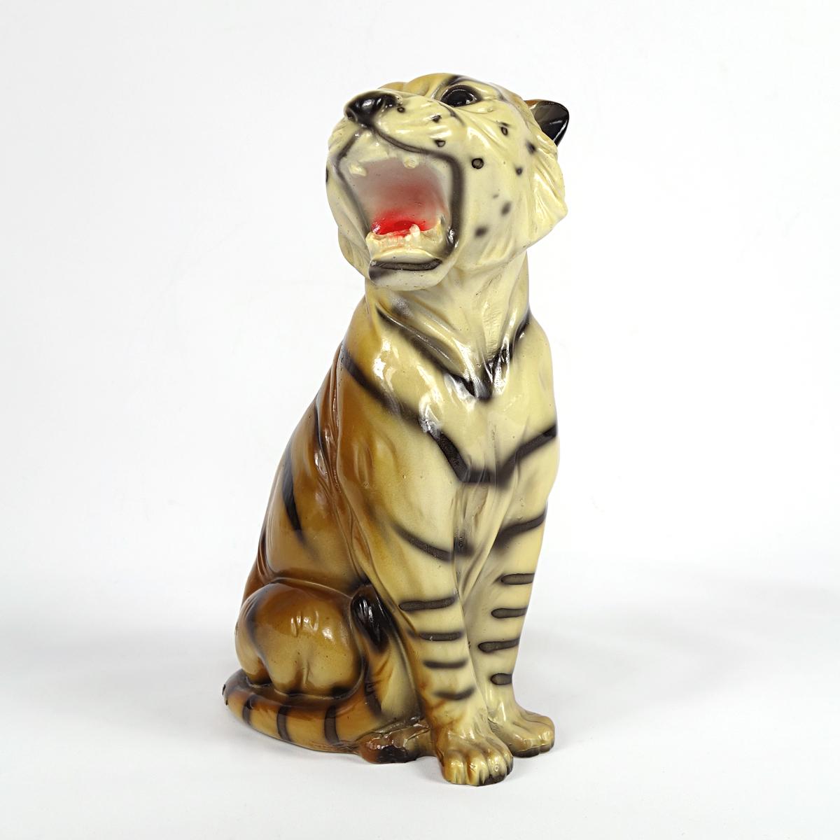 Adorable ceramic tiger cub in the style of, or maybe made by, Ronzan of Italy.

Meowing for its mother this little baby already looks dangerous with its sharp teeth and claws. 

A wonderful addition to your hall table, mantlepiece or bookcase.