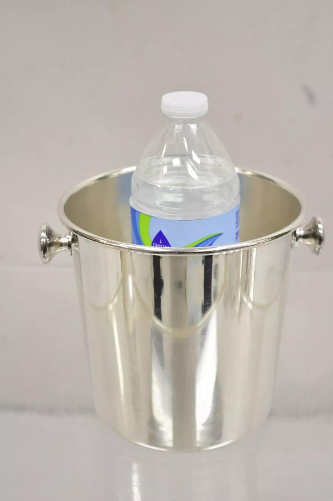 Vintage Mid Century Modern Style Small Silver Plated Champagne Wine Chiller Bucket  - a Pair. Item features twin handles, unique smaller side, marked 