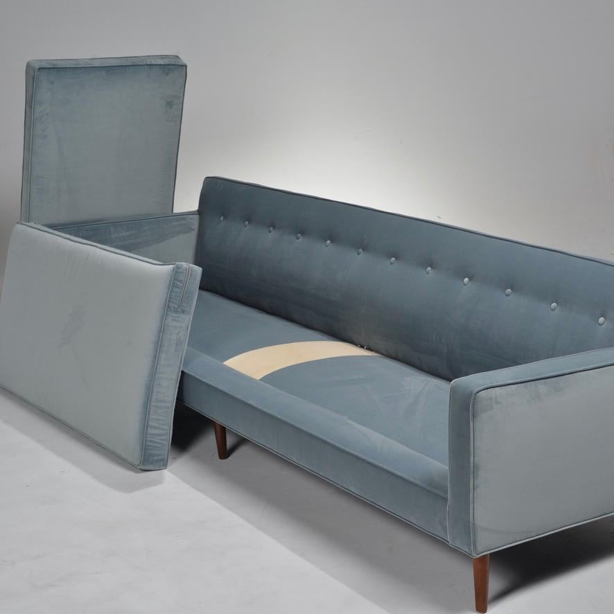 Edward Wormley for Dunbar sofa with tapered rosewood legs and newly upholstered in a plush soft blue velvet.  Every inch of this grand sofa has been painstakingly restored/replaced and is in showroom condition.  




   