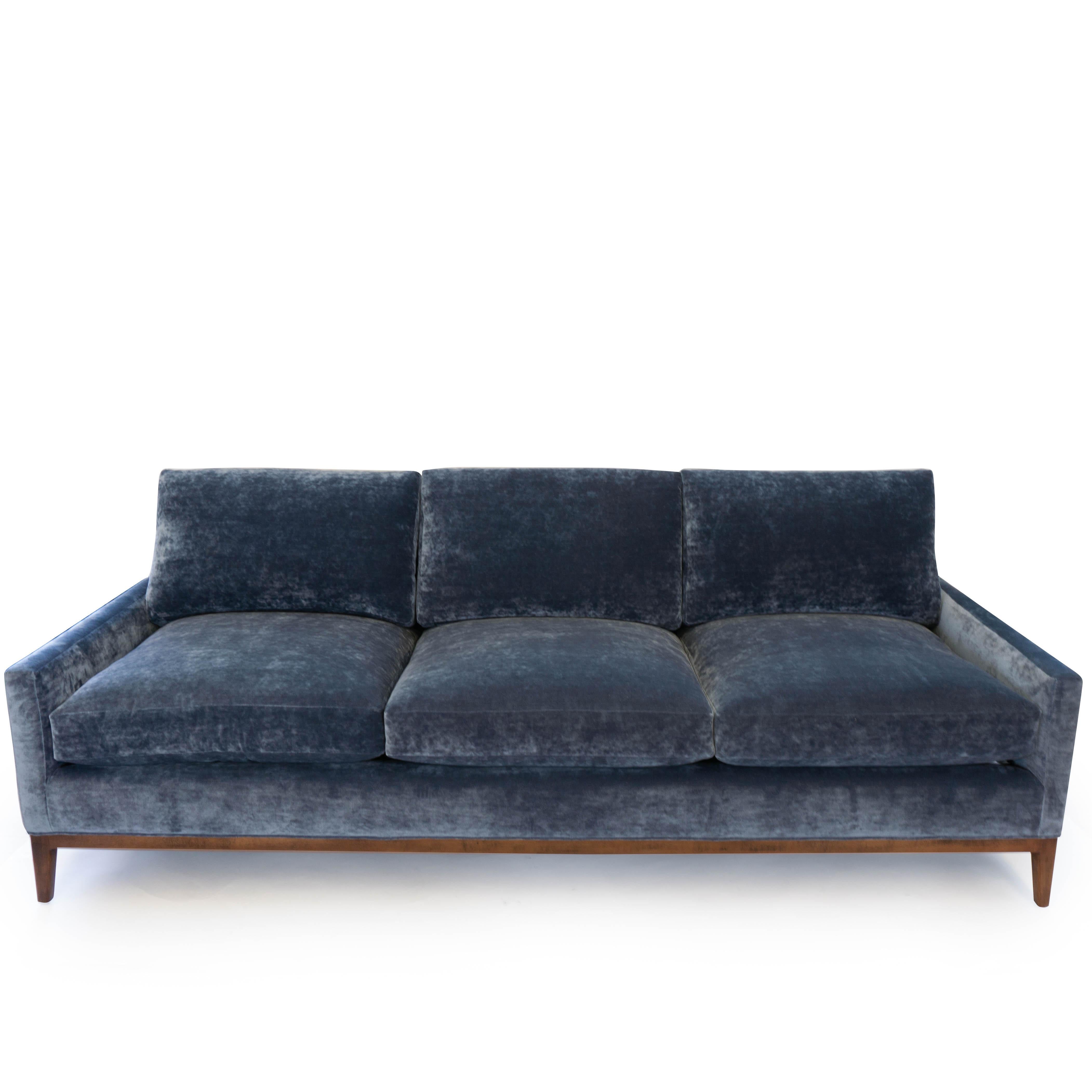 This Mid-Century Modern inspired sofa (known as 