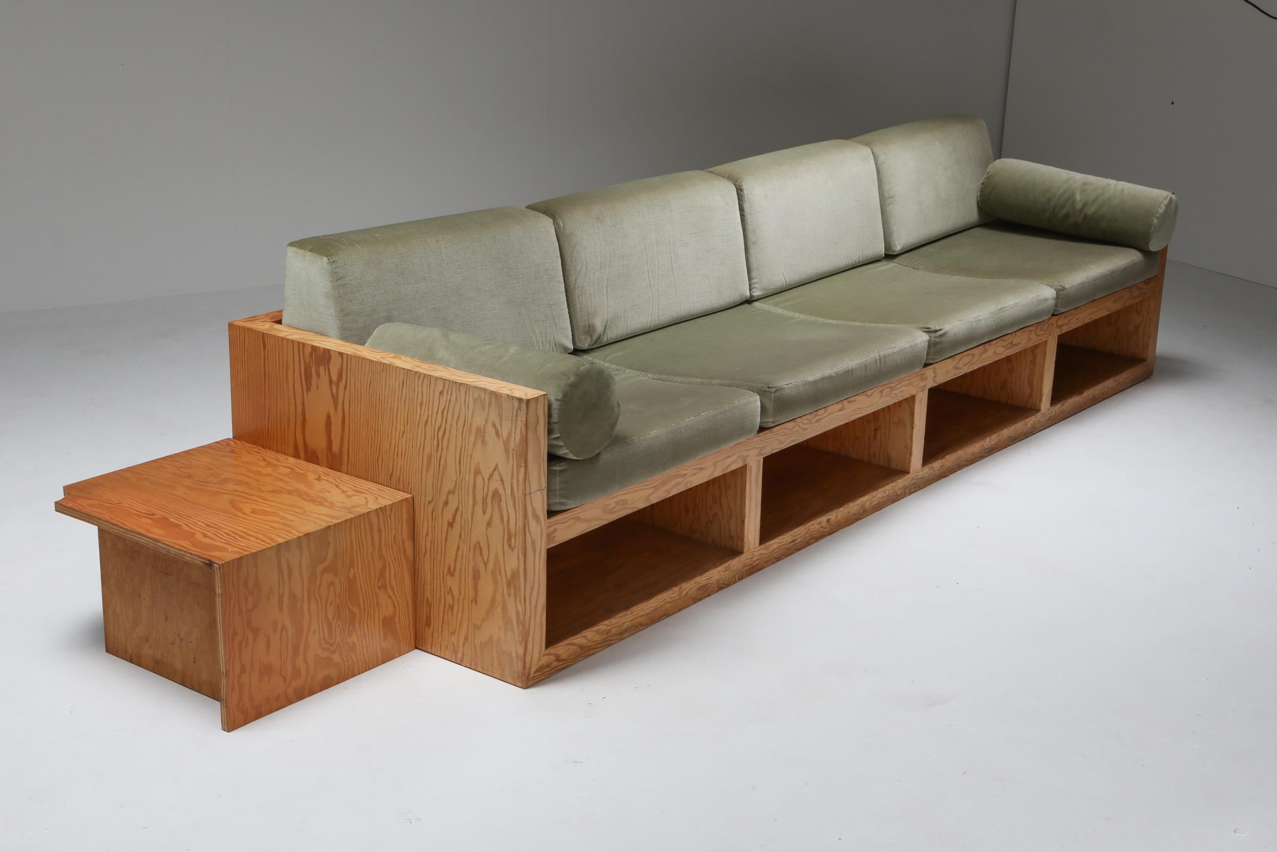 Custom designed couch by a Dutch architect from the 1960s
Minimalist and modernist design which incorporates great functionality.
The small side table is included in this listing.
This piece is part of a larger living room set of which all pieces