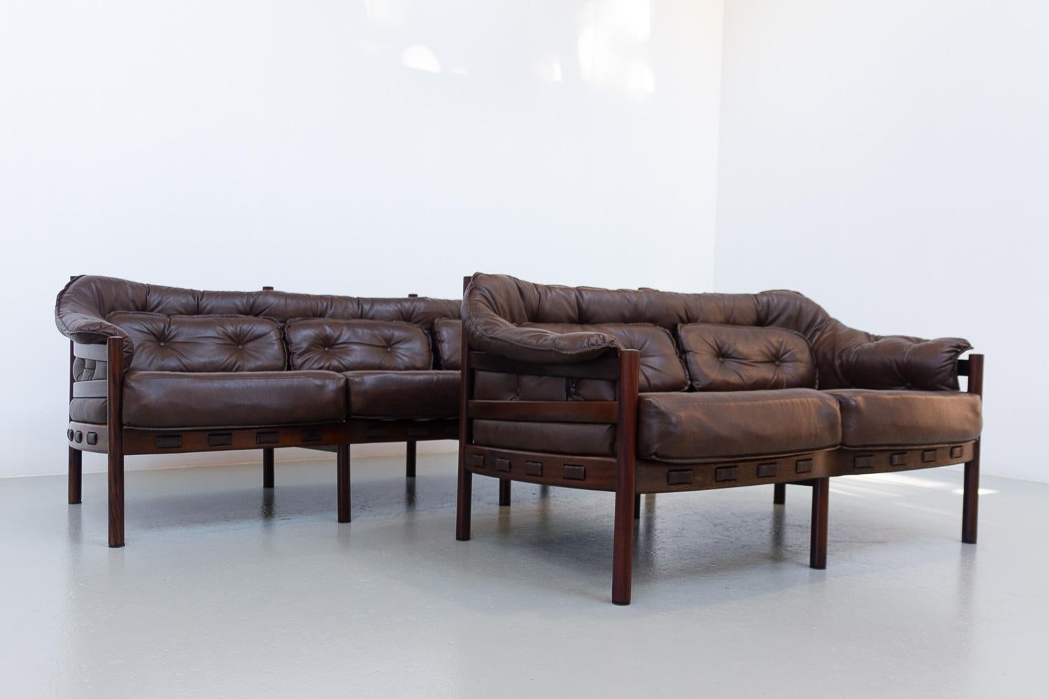 Mid-Century Modern Sofa Set by Ellekær & Norell for Coja Sweden, 1970s.
Pair of Scandinavian Modern Coja sofas. This set consists of a three-seater and a two-seater/loveseat sofa. 
These beautiful and iconic sofas are attributed to designers Arne