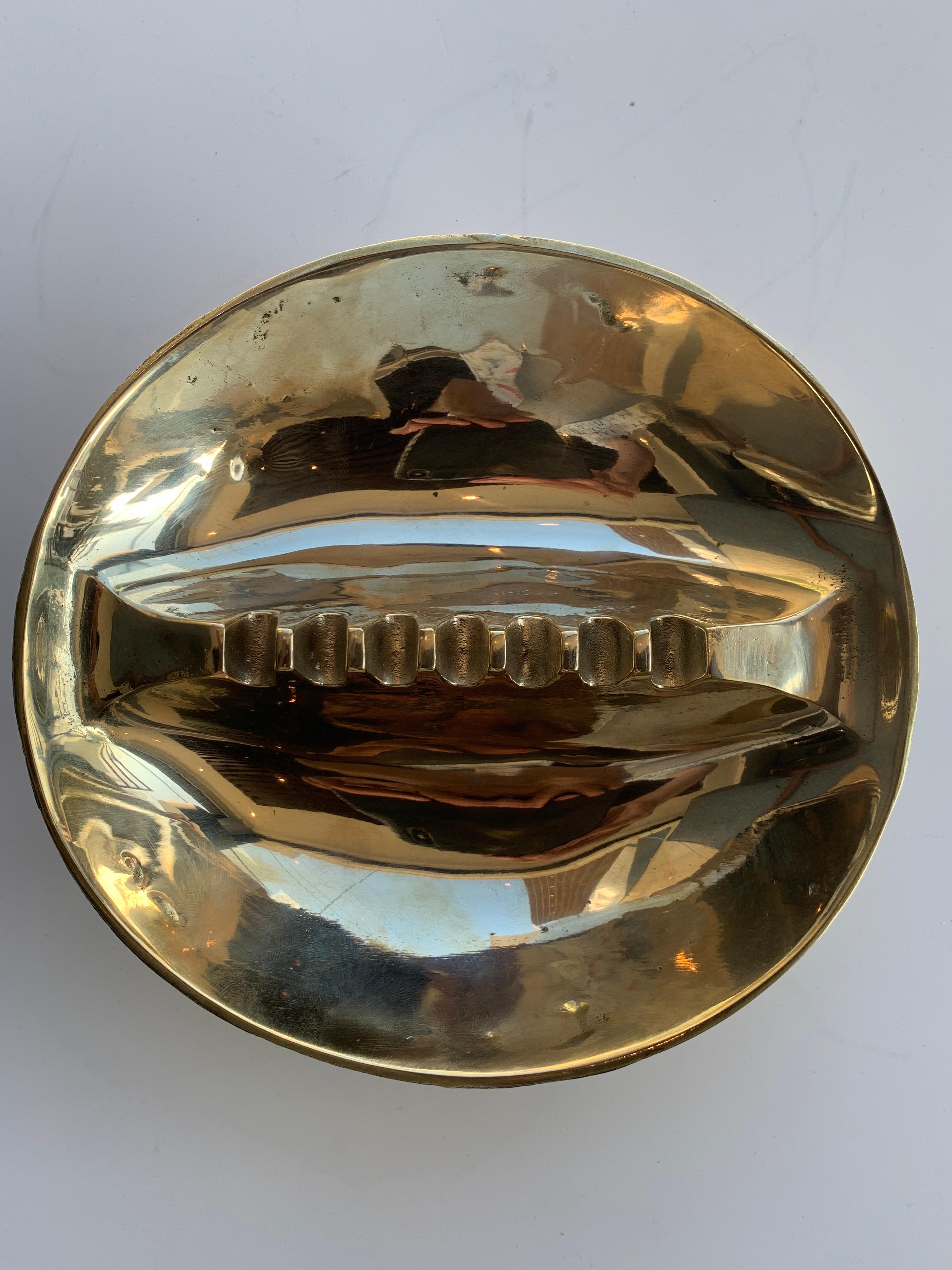 Mid-Century Modern solid brass ashtray, two pieces in stock, hand polished and look new, but from the 1960s.