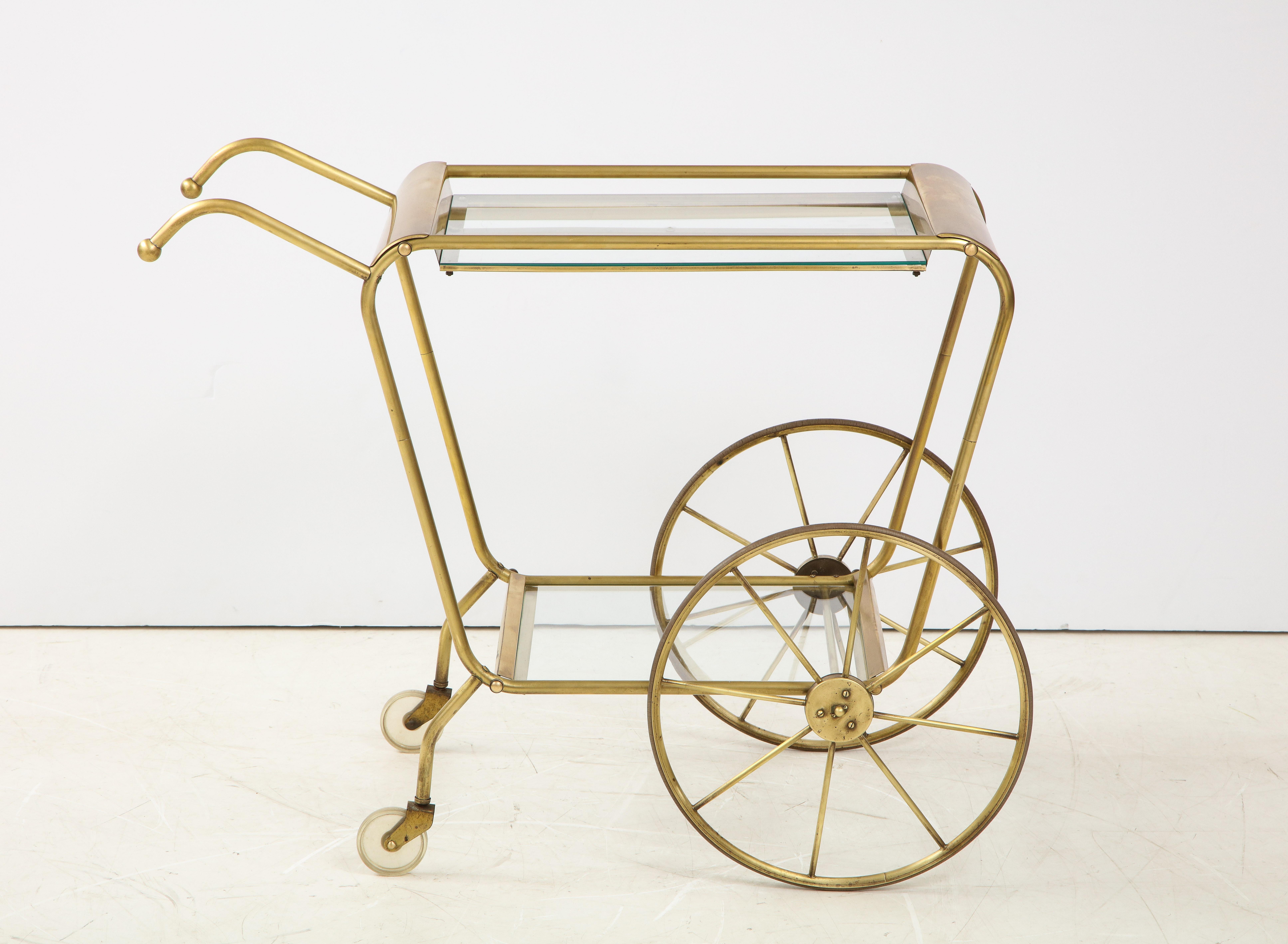 1950s Mid-Century Modern solid brass Italian bar cart, lightly hand polished with some wear and patina to the brass.