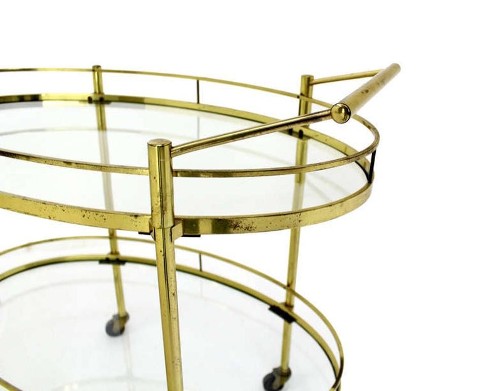 Very nice quality craftsmanship mid century modern solid brass tea cart.
