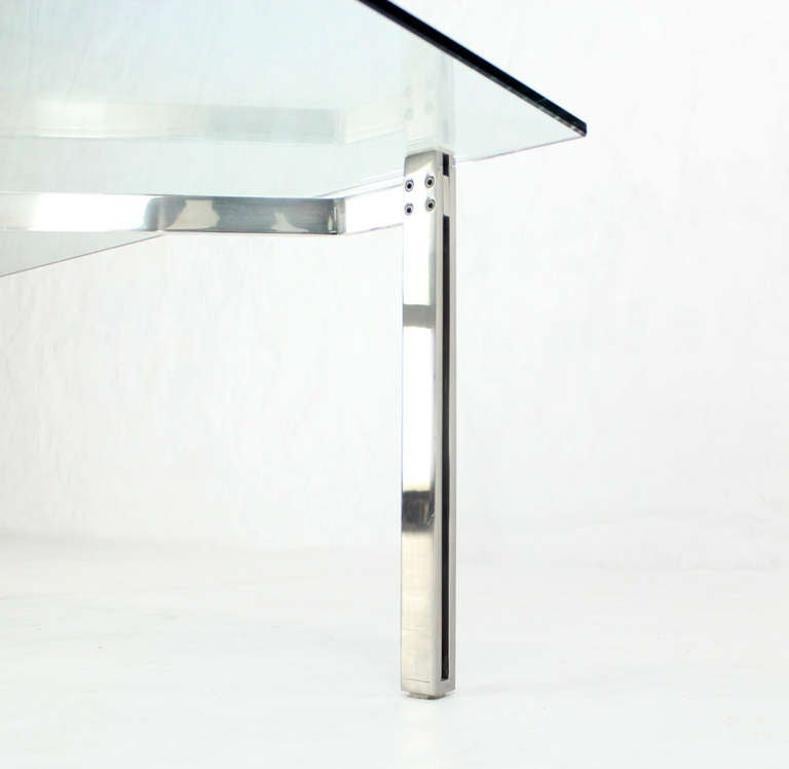 Mid-Century Modern Solid Chrome and Glass-Top Coffee Table style of Kjaerholm.
Heavy polished stainless steel base 3/4