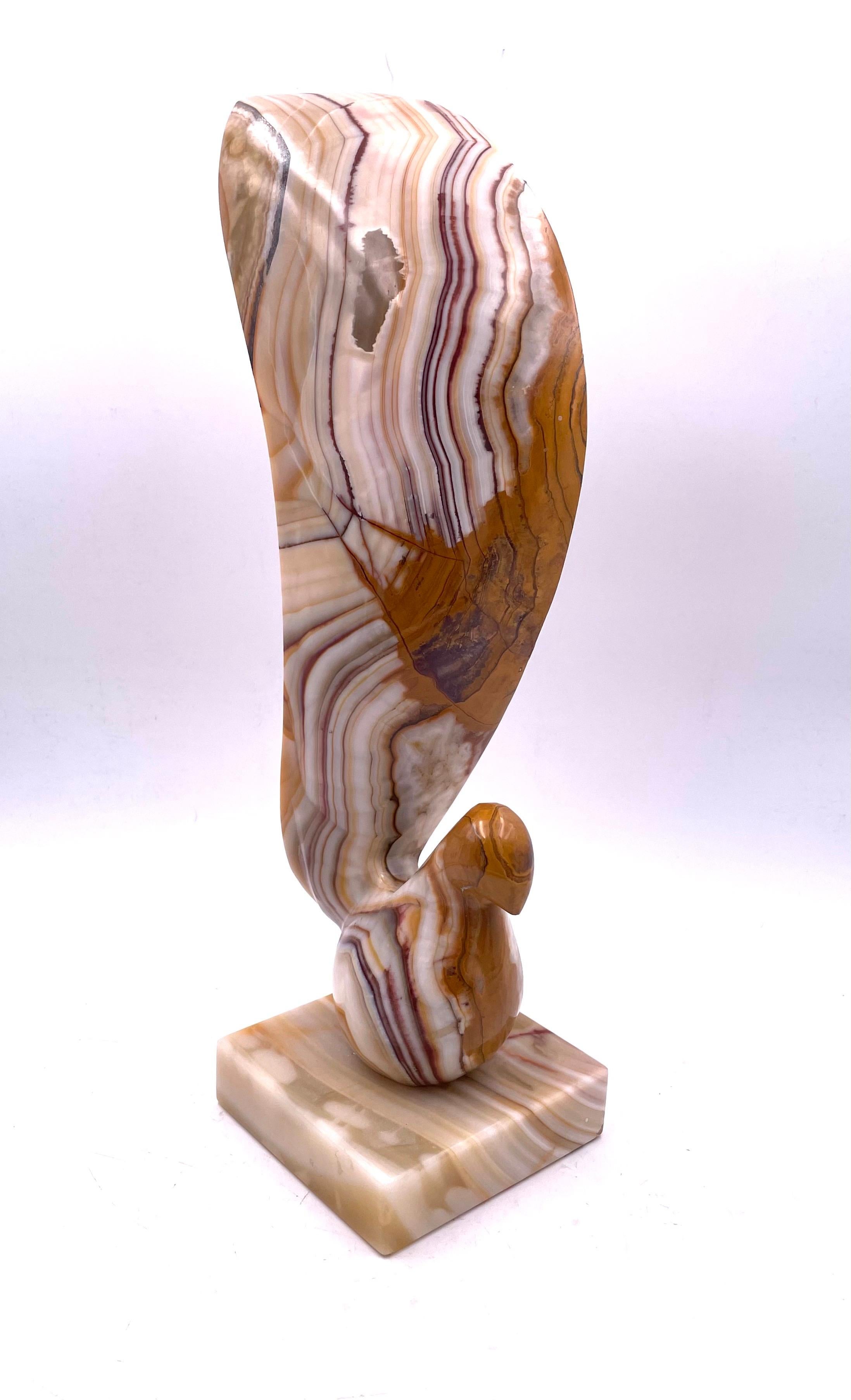 Beautiful solid onyx bird sculpture circa 1970's, excellent condition and beautiful grain on the stone no chips or cracks.