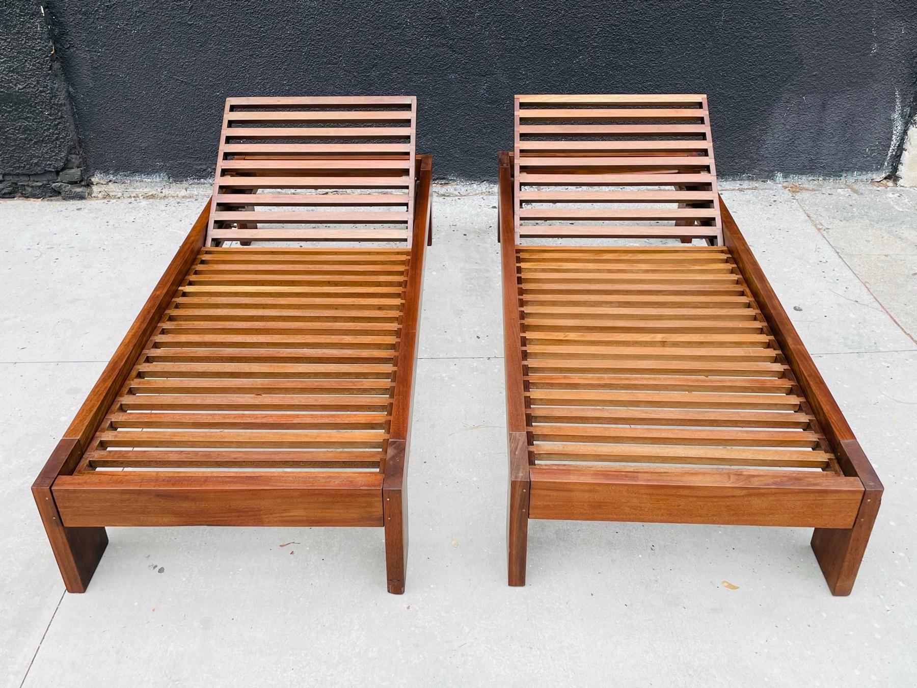 Introducing our Mid-Century Modern, Solid Teak Lounge Chairs from the 1970's. 

These vintage loungers were hand made in the USA in the early to mid 1970's, crafted from high-quality teak wood, providing a sturdy and durable foundation for