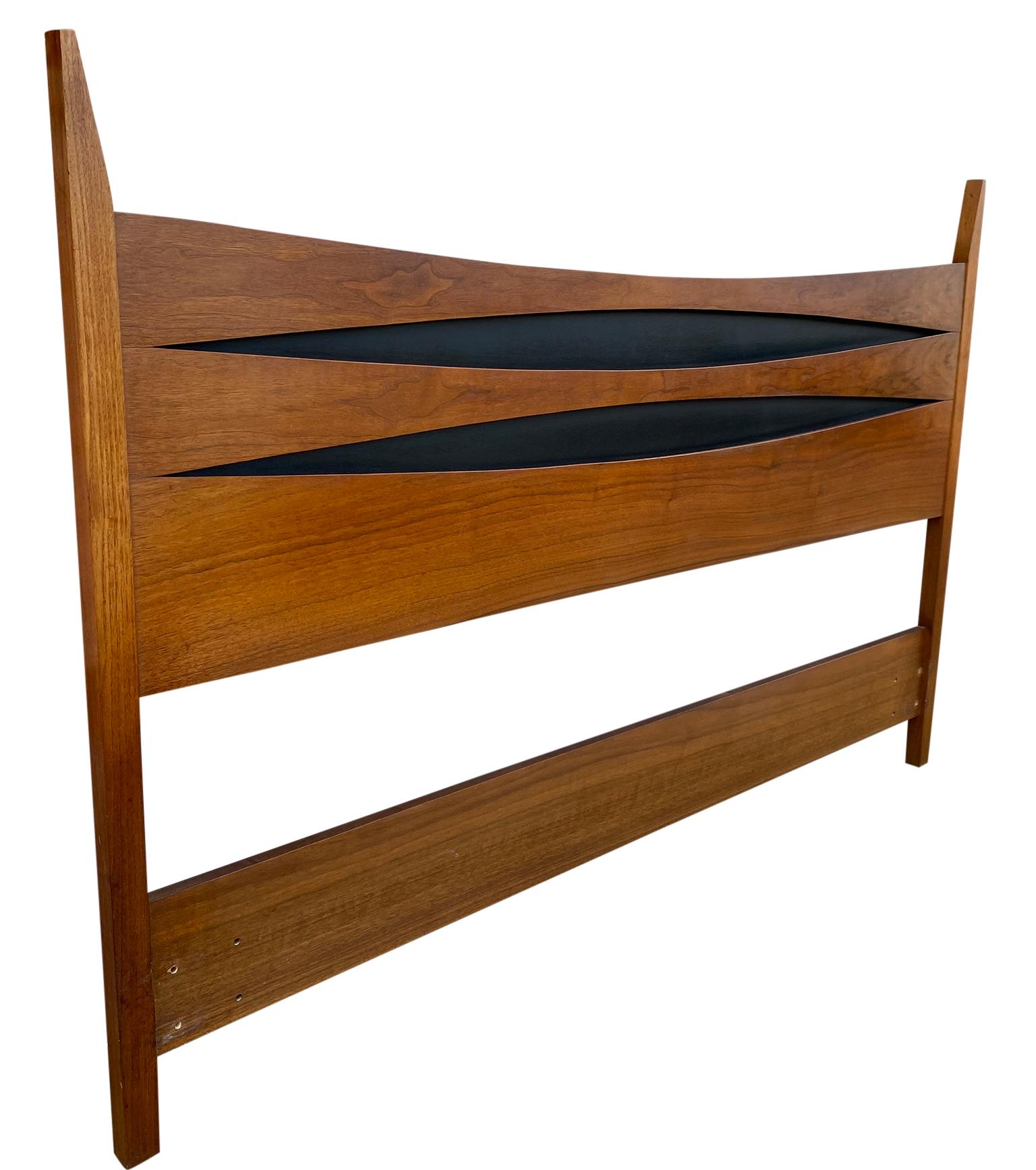 Mid-Century Modern solid walnut Queen bed headboard style of Arne Vodder. Beautiful Design American made circa 1960. Solid walnut and black lacquer details. Made by West Michigan Furniture Company USA.