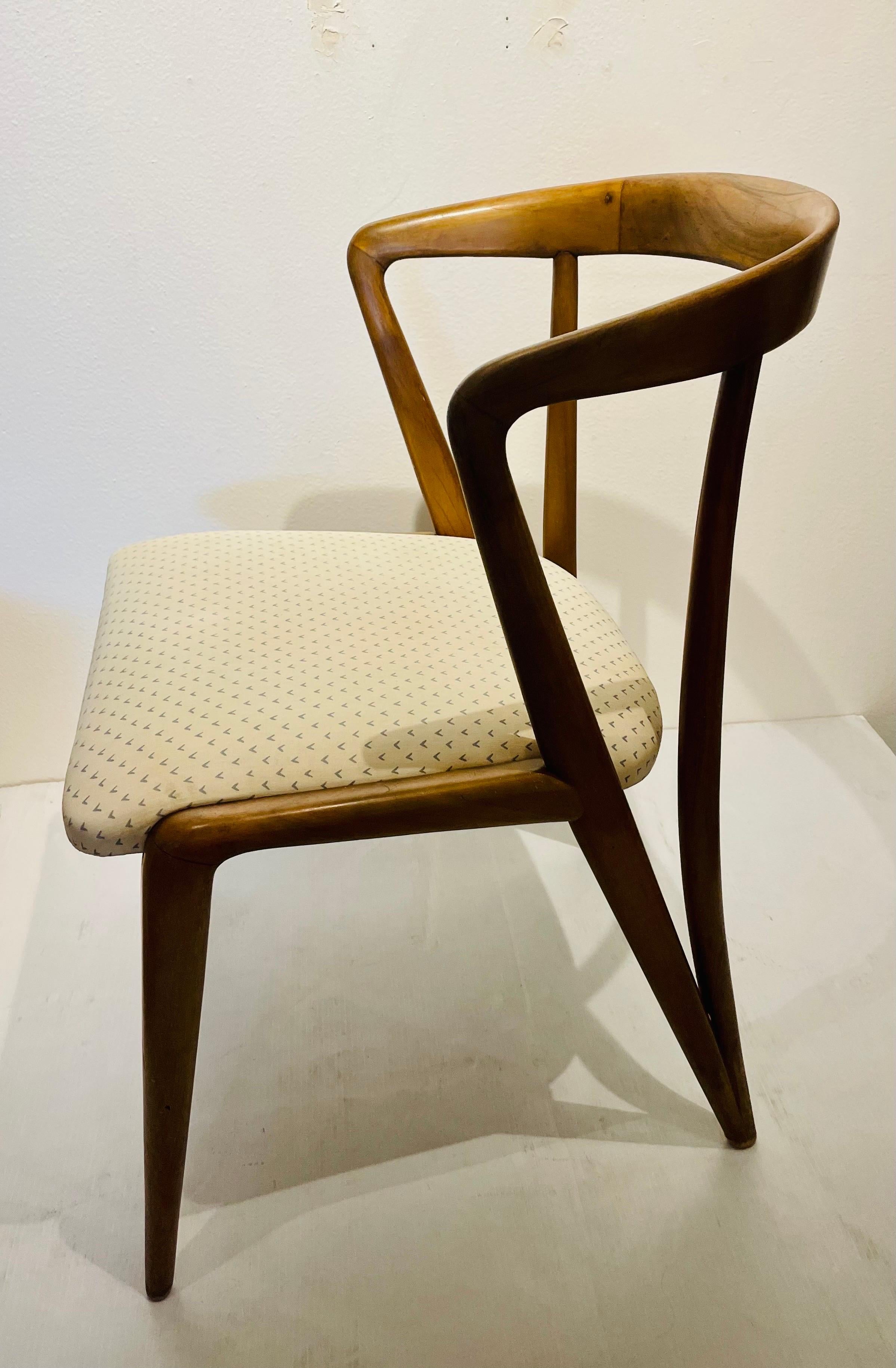 Beautiful and elegant single chair designed by Bertha Schaefer for Singer & Sons, original finish recovered in cloth fabric. the chair is sold in its original condition we have cleaned and oiled it nice clean condition.