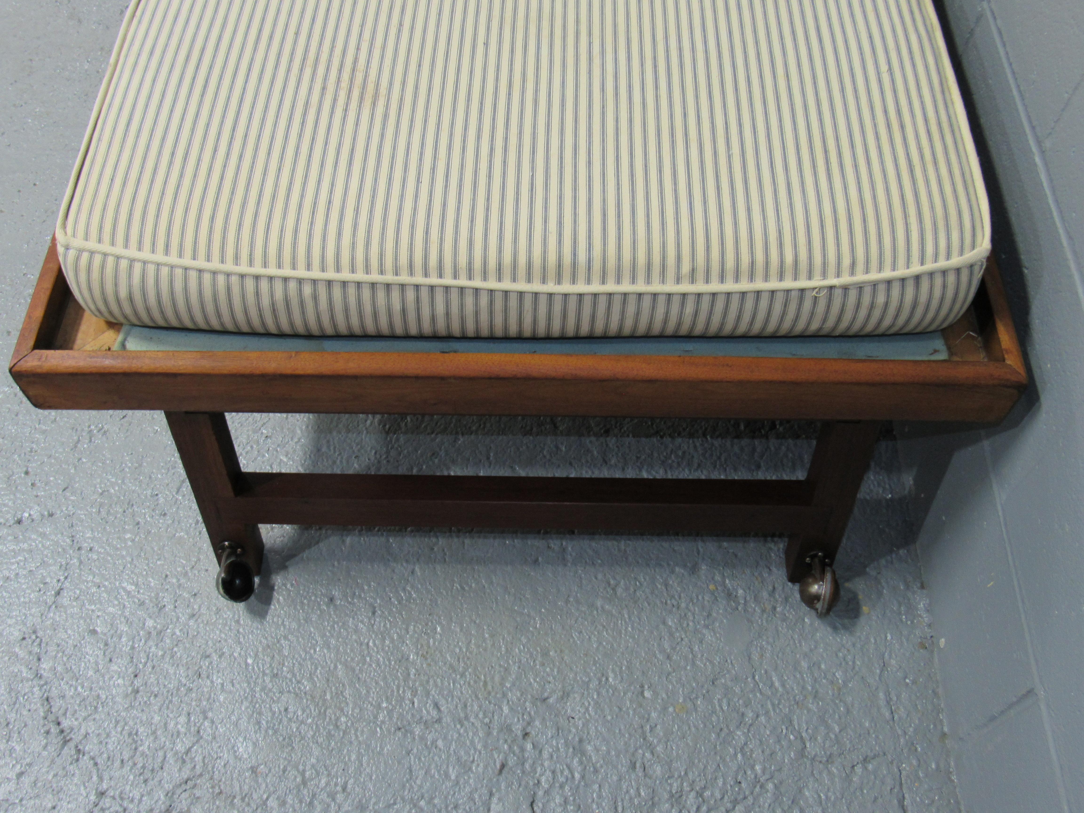 Solid walnut frame Mid-Century Modern sofa, day bed, pull out trundle bed by Design Research. Outstanding quality craftsmanship and nice graining in the solid walnut.
