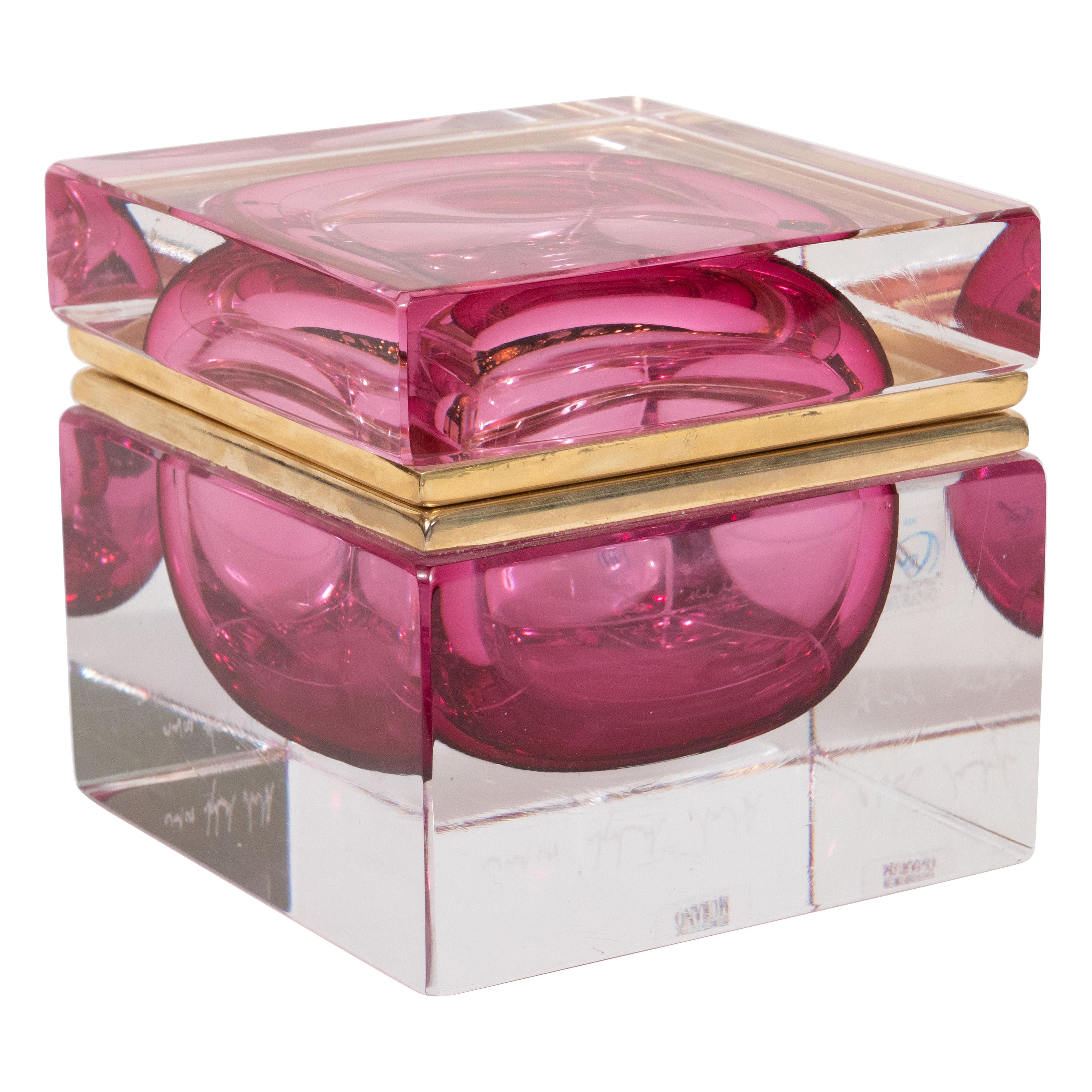 This midcentury glass box was designed by Alessandro Mandruzzato and hand blown in Murano, Italy, circa 1970. The box was created using the Sommerso technique where an inner core is blown and then submerged into molten glass of a contrasting color.