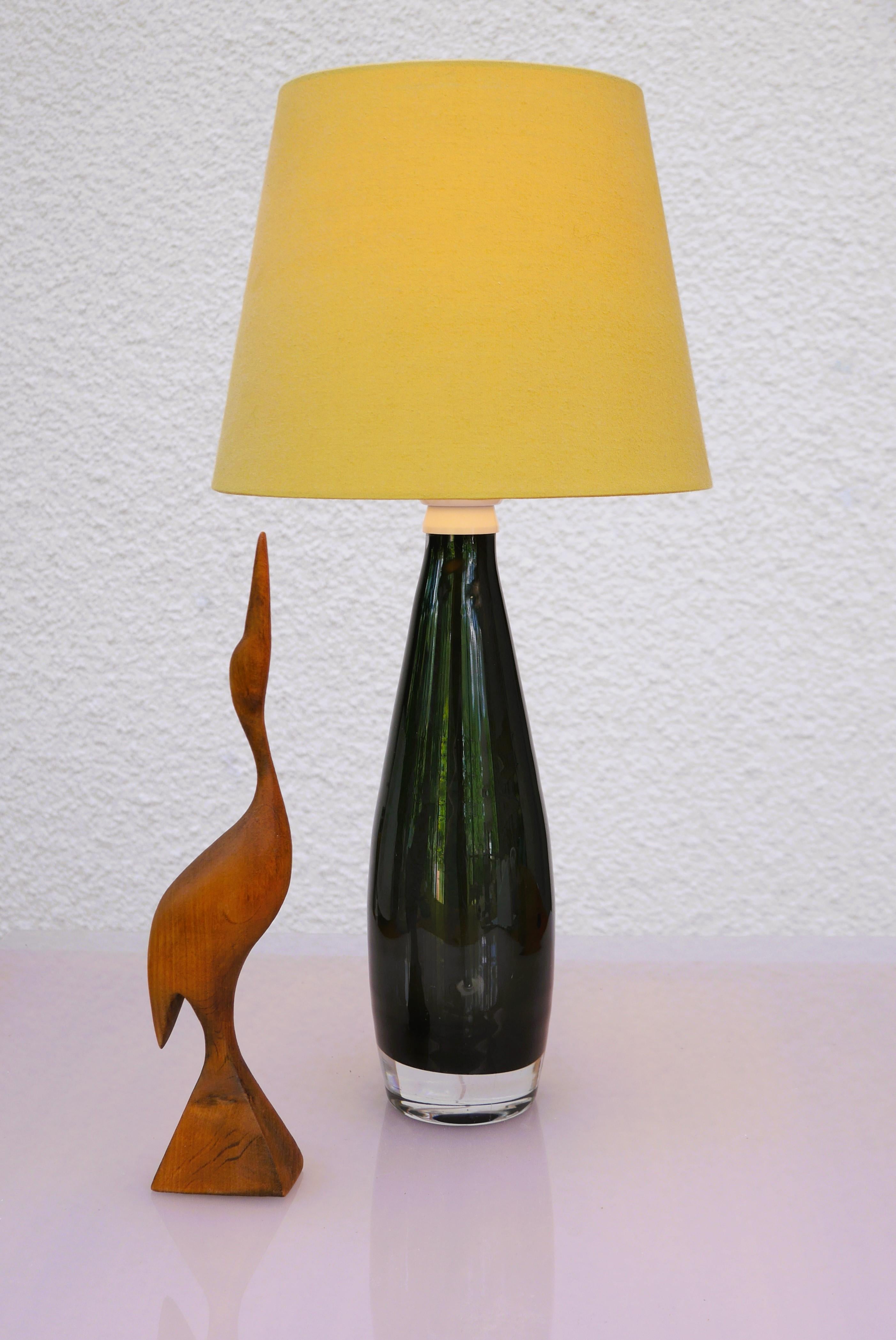 A rather large and gorgeous vintage glass table lamp, handmade and signed by Ove Sandberg for Kosta, Sweden. The price includes FREE shipping. A sommerso glass lamp base several layers of glass has been used with a contrasting dark color on the