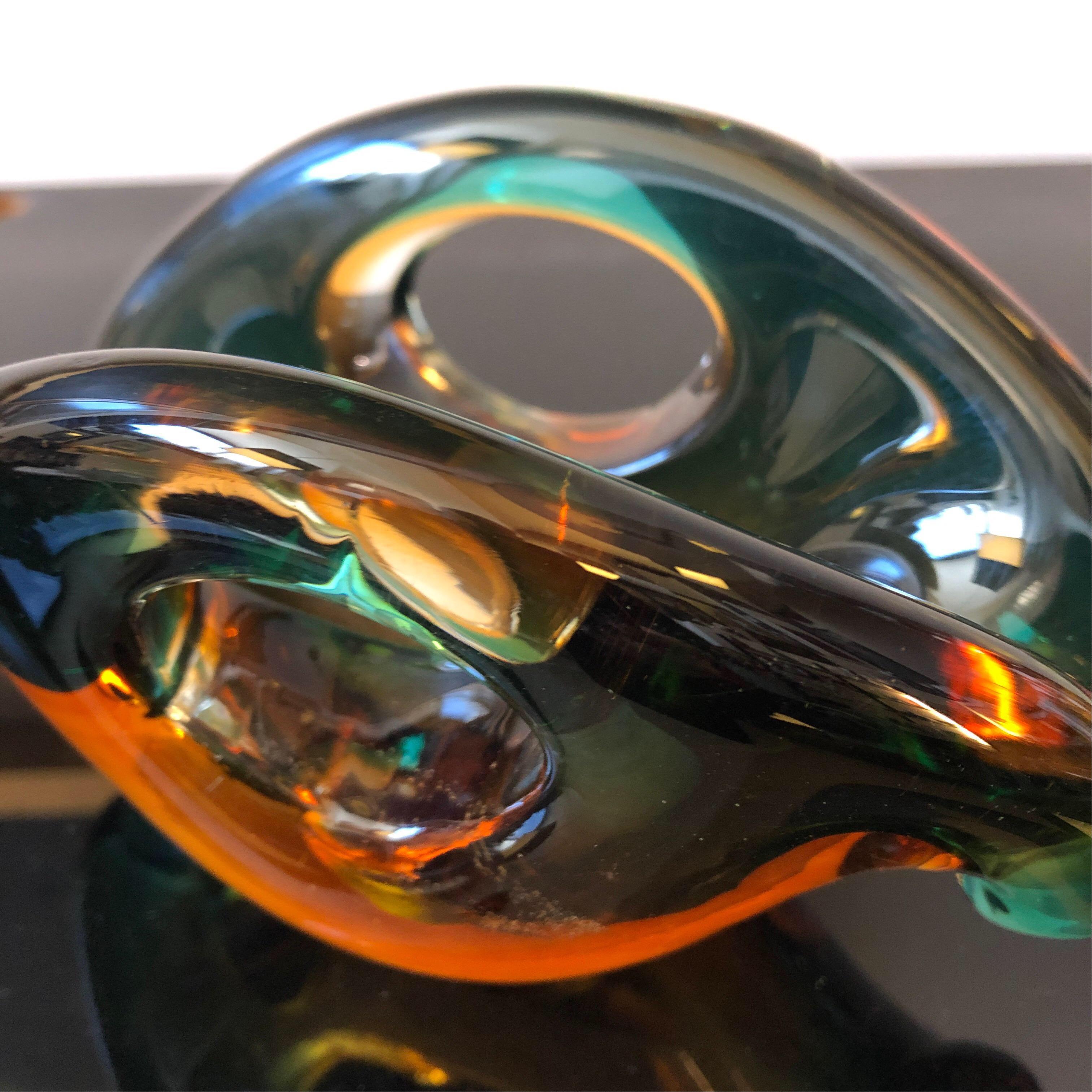 A green and brown sommerso Murano glass bowl made in Italy in the Seventies, signed A. Seguso Murano on the bottom.
