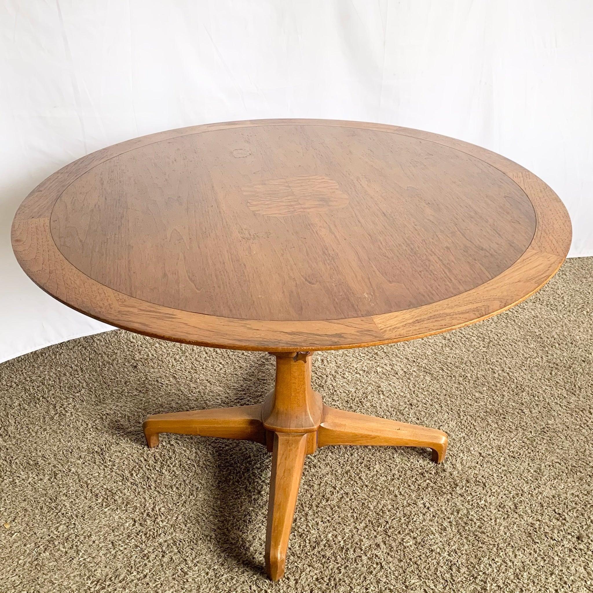 Mid Century Sophisticate Swivel Coffee Table by Tomlinson—walnut medallion top, adjustable swivel base (18″–28″)—vintage sculptural elegance.
 

 Some wear to the surface finish as can be seen in the photos.
 

 We sell items as acquired, without