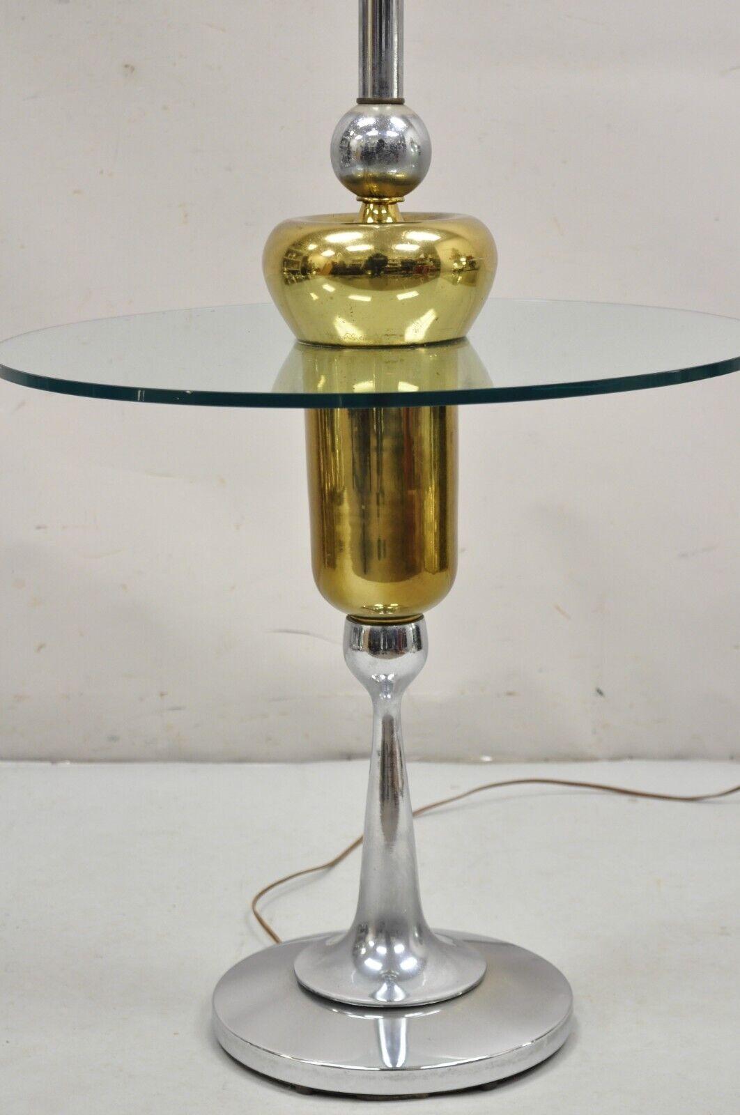 Vintage Mid Century Modern Space Age Atomic Era Chrome Brass & Glass Side Table / Floor Lamp. Circa 1970s.
Measurements: 
Overall: 57