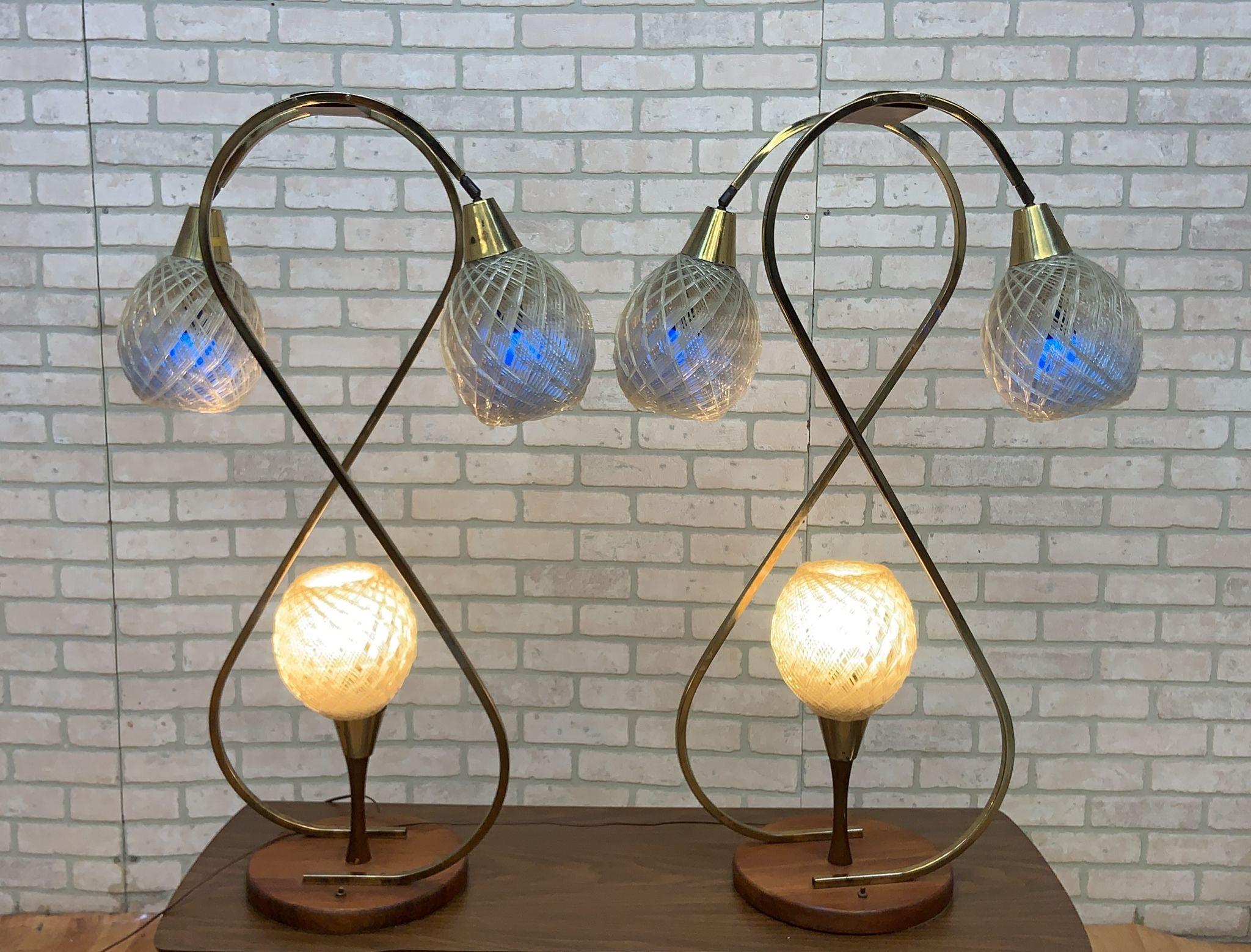 Mid Century Modern Space Age Atomic Lucite Spaghetti Globe Table Lamp - Pair

Super cool pair of mid century modern space age atomic table lamps each with 3 lucite spaghetti shades. Worsk great!!

Circa 1970

Dimensions

W 25”
D 10”
H 42”
