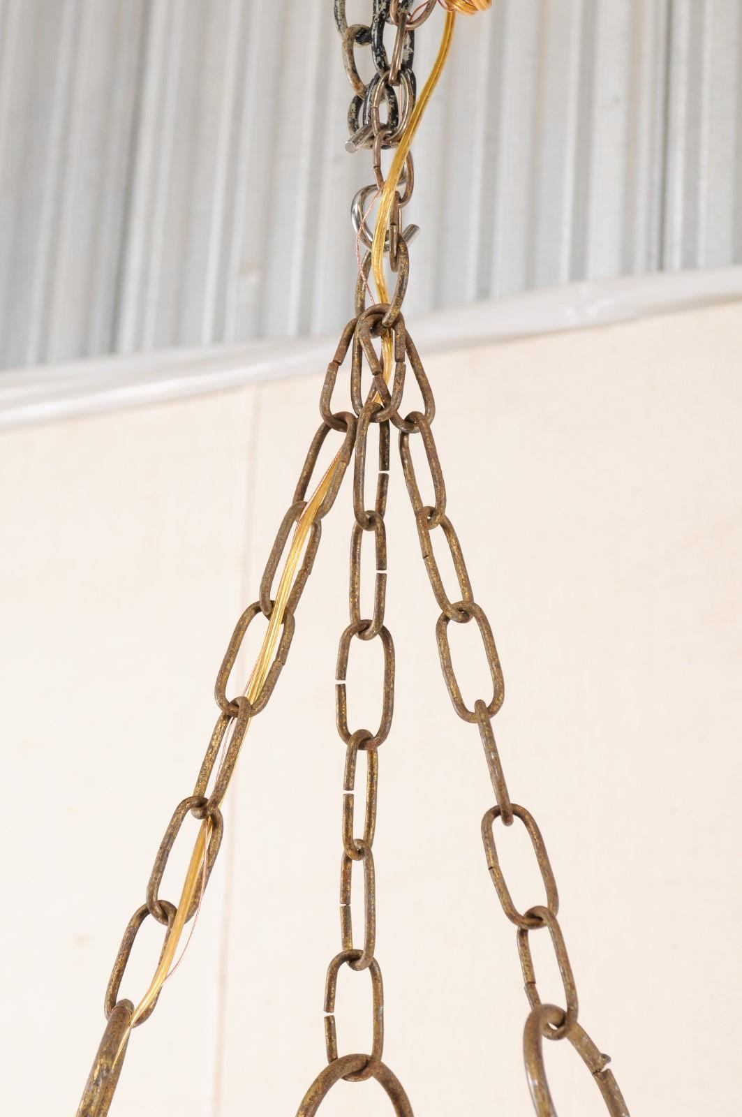 Mid-Century Modern Spanish Brutalist Iron Chandelier in Gold Finish In Good Condition In Atlanta, GA