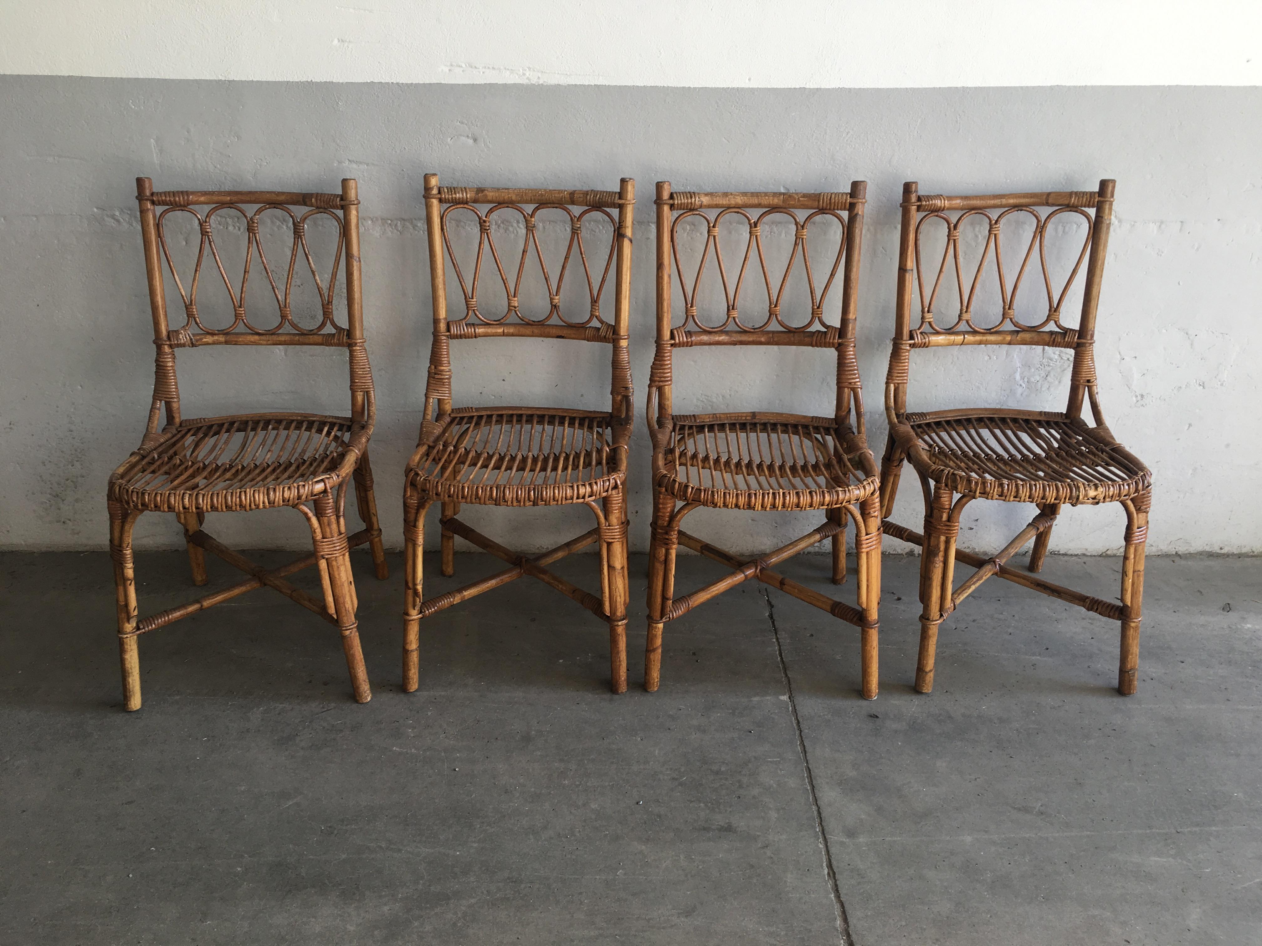 Mid-Century Modern Spanish set of four bamboo dining chairs.