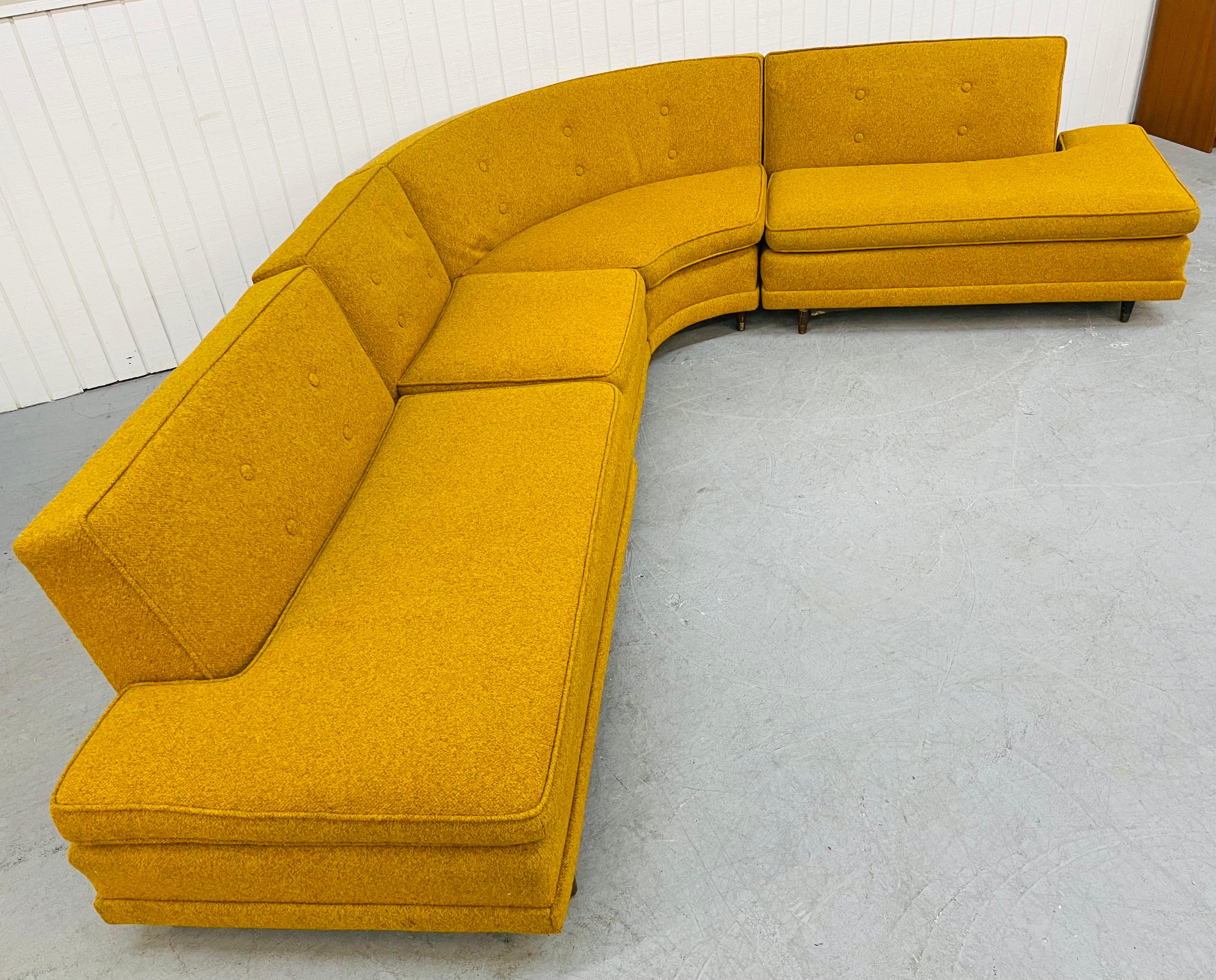 This listing is for a Mid-Century Modern spicy mustard sectional sofa. Featuring four separate pieces, straight line armless design, original spicy mustard upholstery, short walnut legs, and buttons.