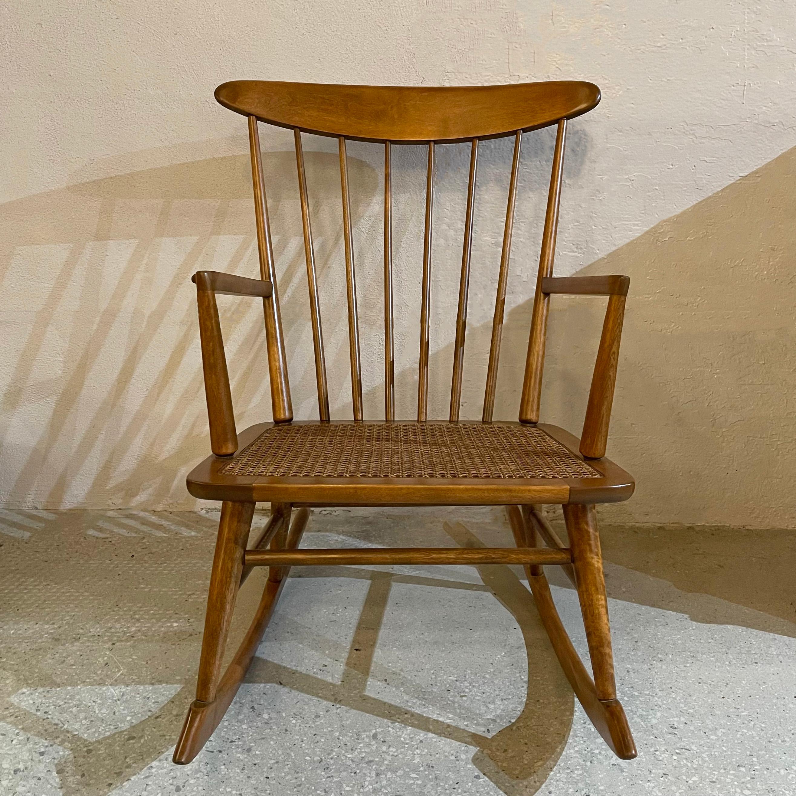 American Mid-Century Modern Spindle Back Cane Seat Rocking Chair For Sale