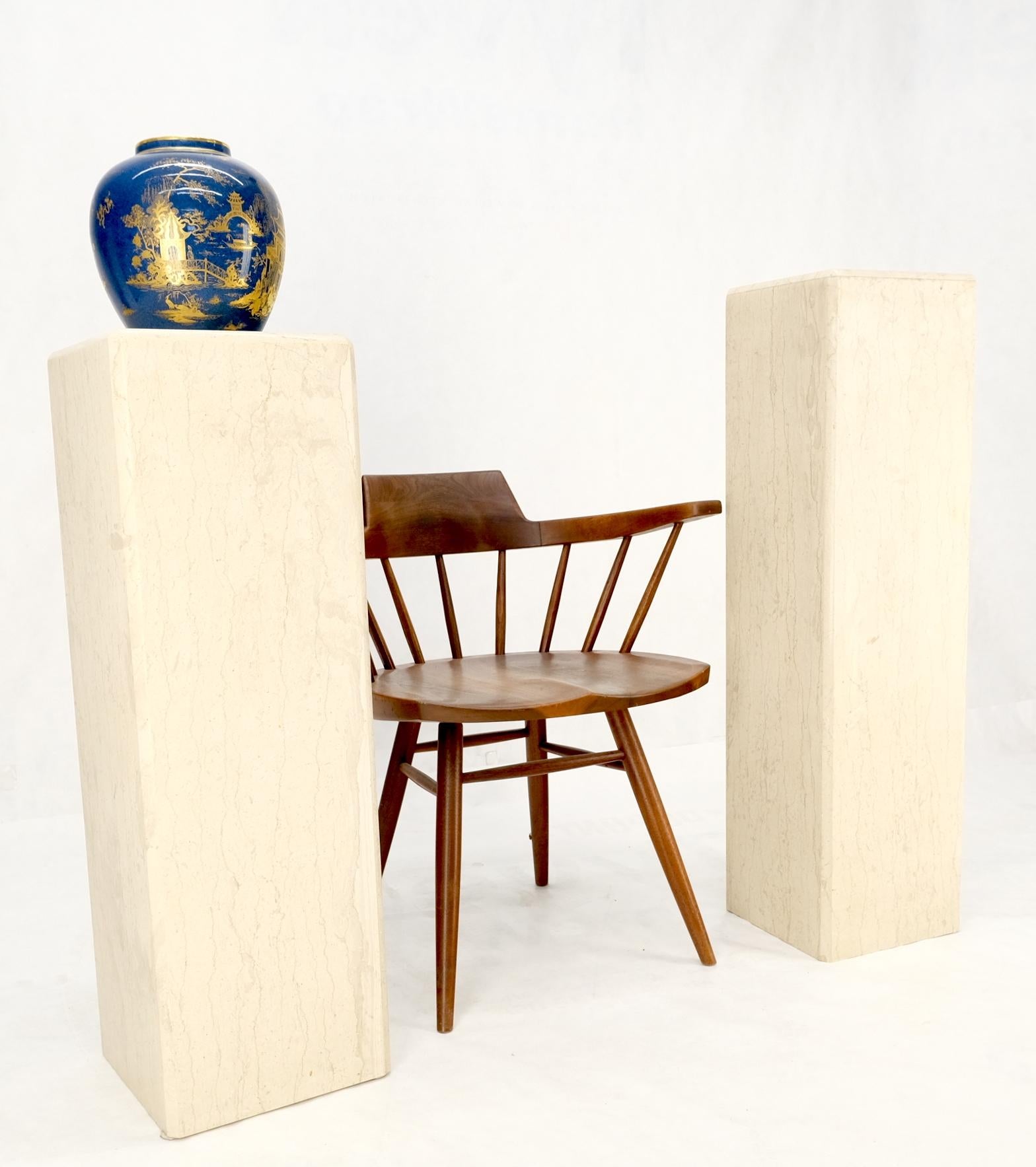 Two pedestals one measures 11