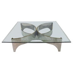 Tavolo da centro quadrato attribuito a Frank Stella, metallo cromato e piano in vetro