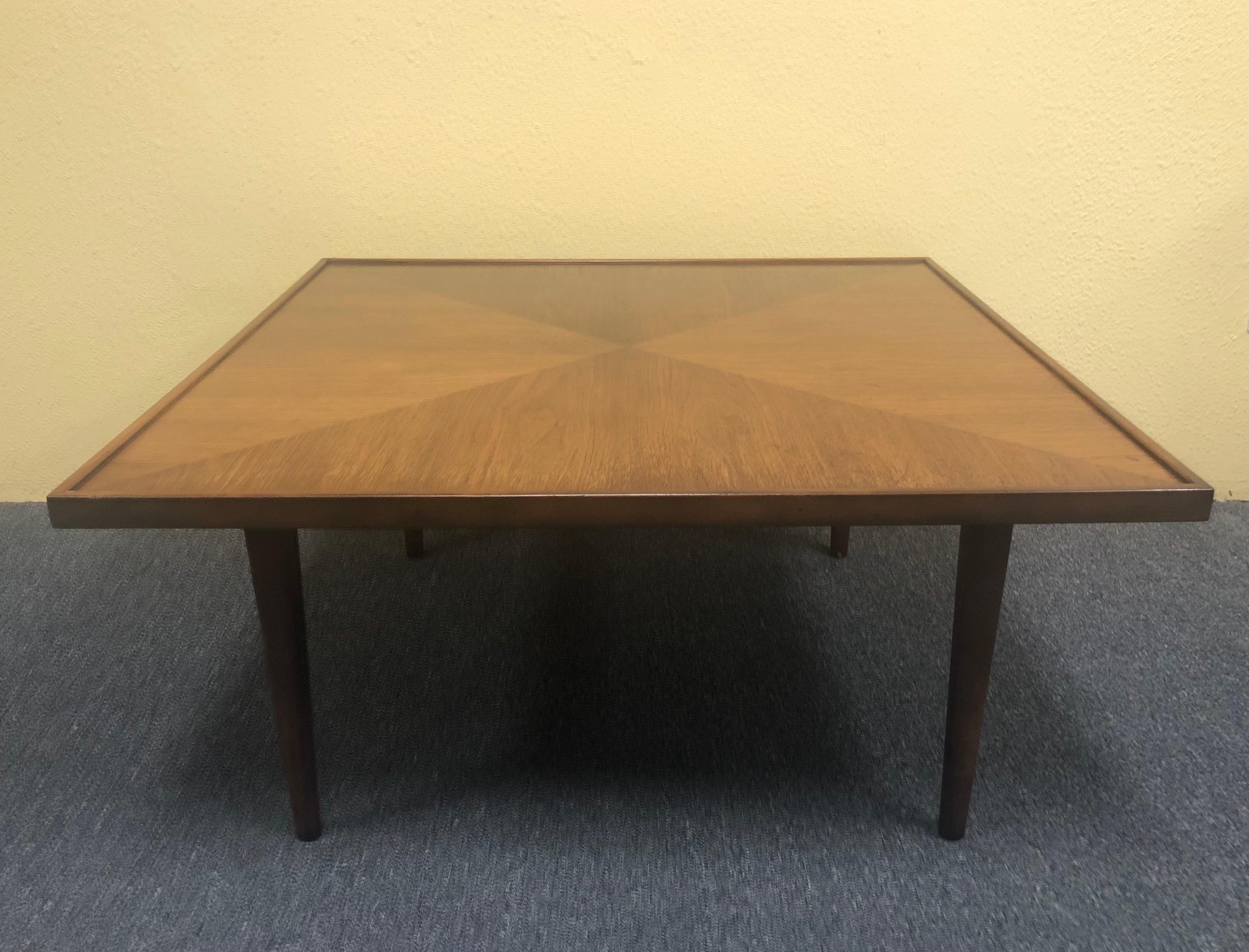 Mid-Century Modern square coffee table in walnut, circa 1970s. The table is 32