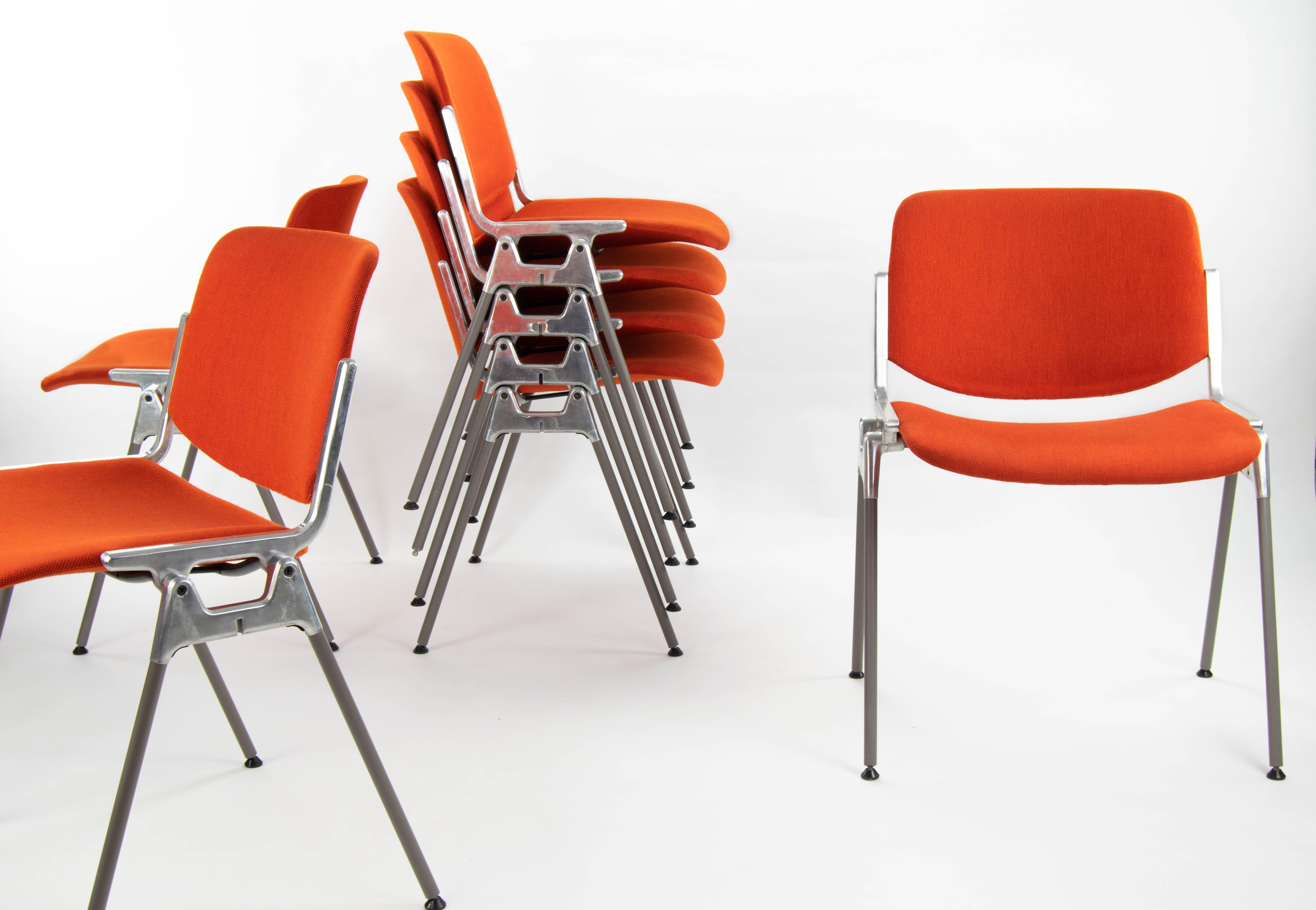 Set of seven stackable chairs model DSC 106 designed by Giancarlo Piretti in 1965 and produced by the Italian firm Castelli. Aluminum and steel structure, original upholstery in very good condition.
Measurements:
High 77 cm
Seat height 45.5