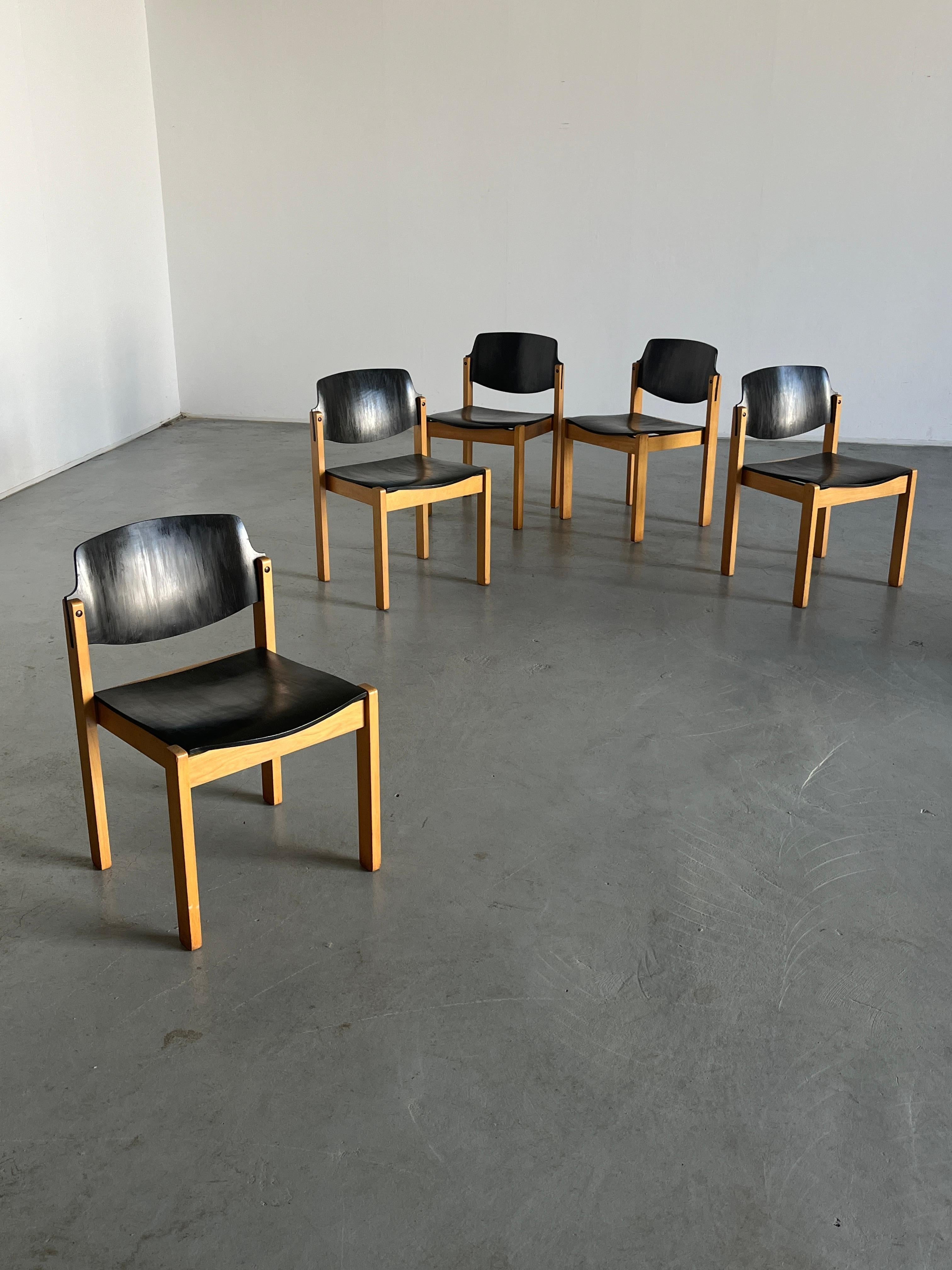 Mid-Century Modern stackable dining chairs or visitor chairs in beechwood and stained plywood, following the style of Rolan Rainer, produced in the early 1970s in West Germany.
Good production quality.

Sold per piece.
12 pieces available.

Original