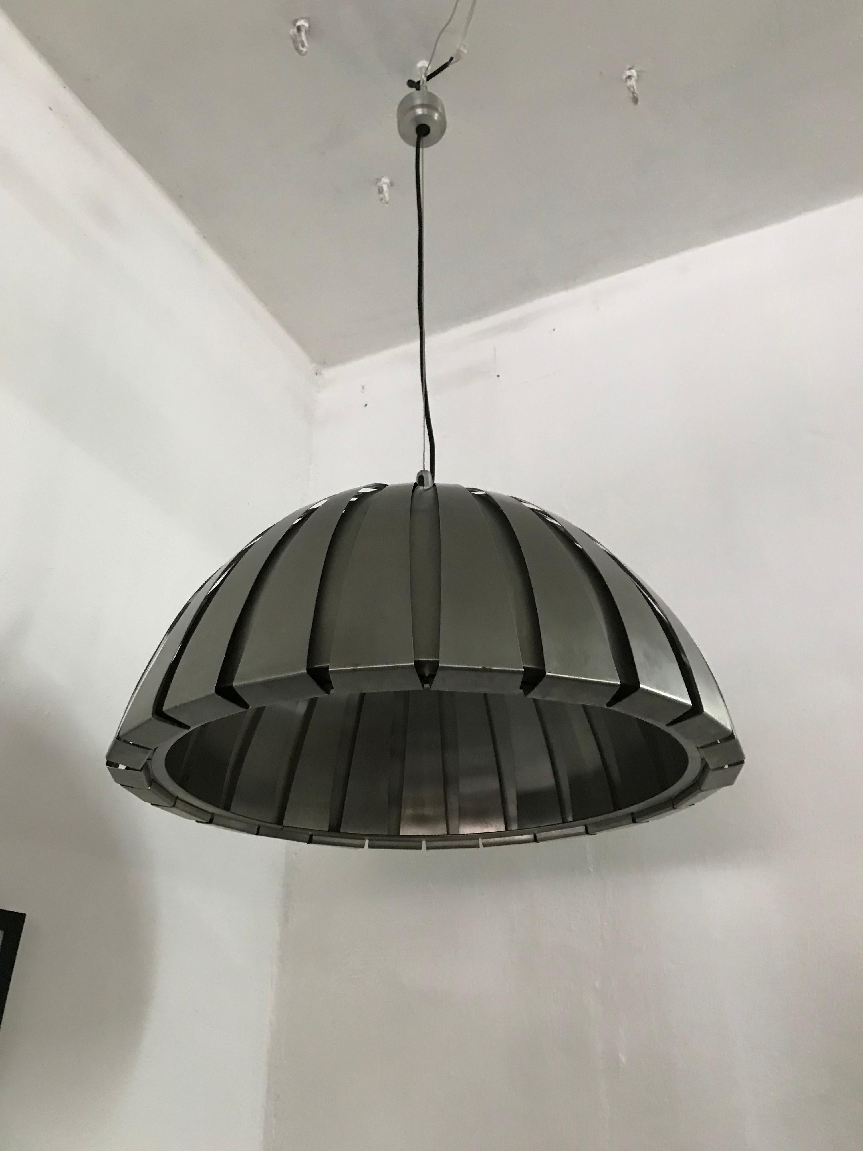 Space age pendant lamp, Model Calotta 1749 designed by Elio Martinelli for Martinelli Luce, in brushed stainless steel, still holding the original sticker.