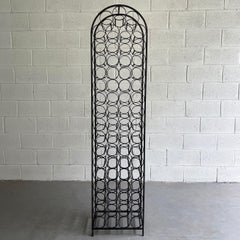 Botellero de hierro forjado de pie moderno de mediados de siglo Por Arthur Umanoff