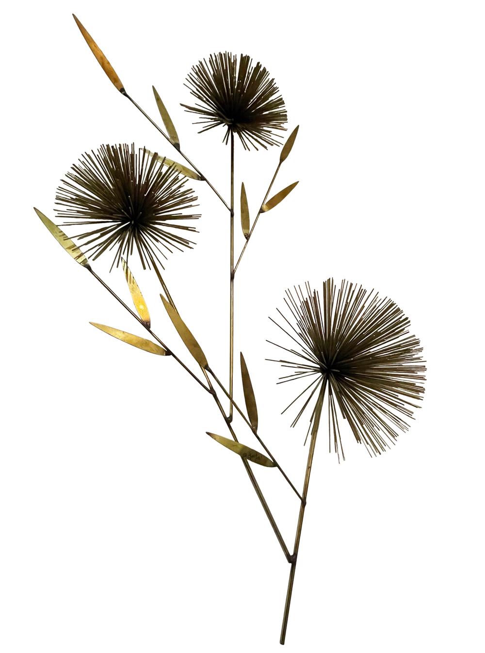 A vintage multi starburst wall sculpture by Curtis Jere circa early 1970's. It consists of brass / bronze colored steel wires in a pom pom flower form. Ready to use condition.