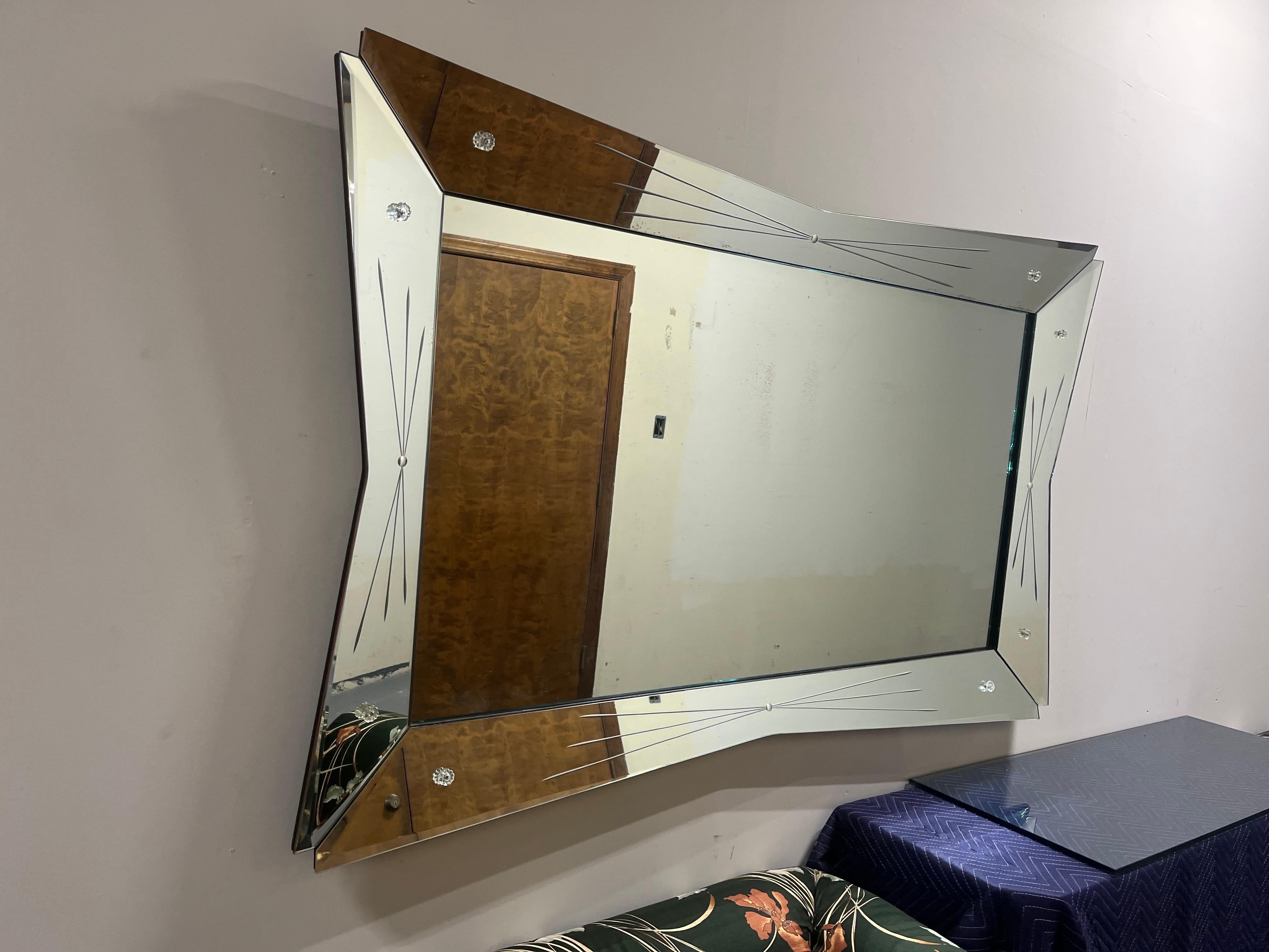 Mid Century Venetian Wall Mirror with an Atomic vibe. Rare take on a classic. Four angled panels with starburst detail.