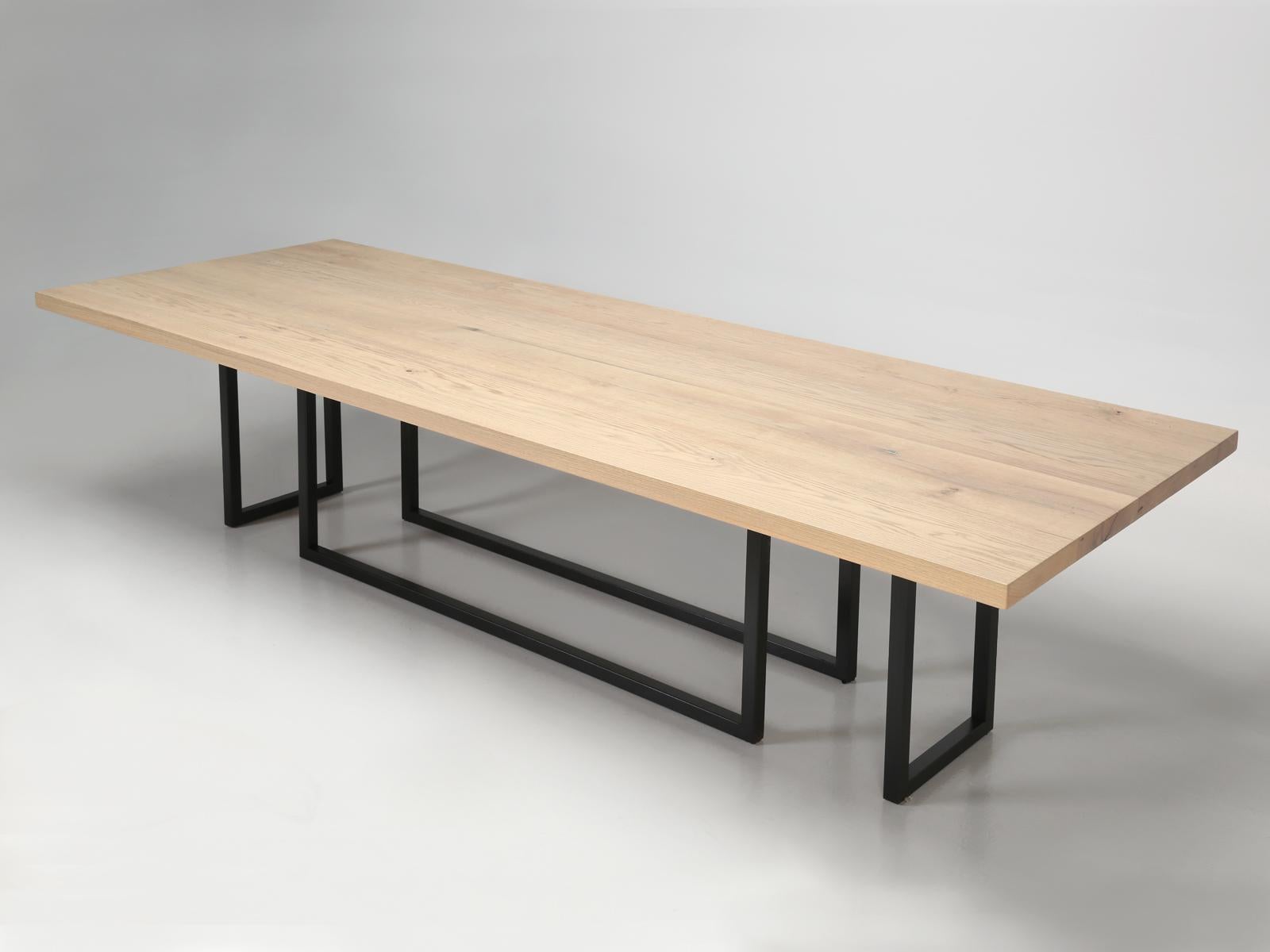 Pending availability of reclaimed oak, we can duplicate this extra thick, reclaimed white oak top, where each board measures a full 12” in width and generally run over 2” in thickness. Our old plank steel and oak dining table, is available in any
