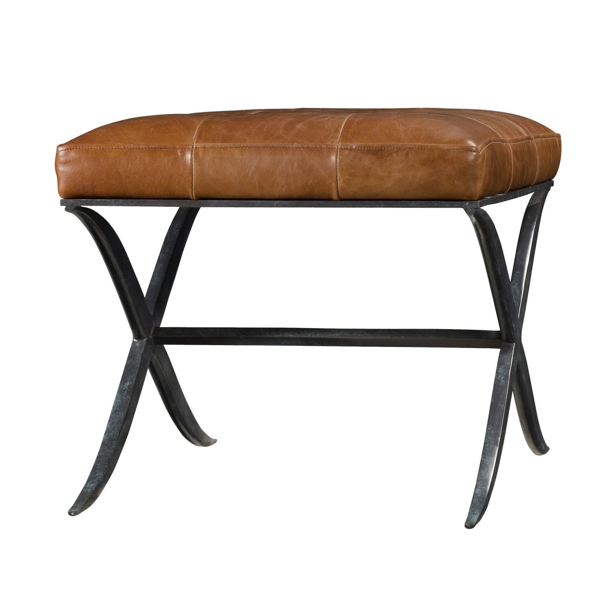 A sleek midcentury style steel and leather upholstered X-frame stool. With a striking verdigris steel X-frame base.