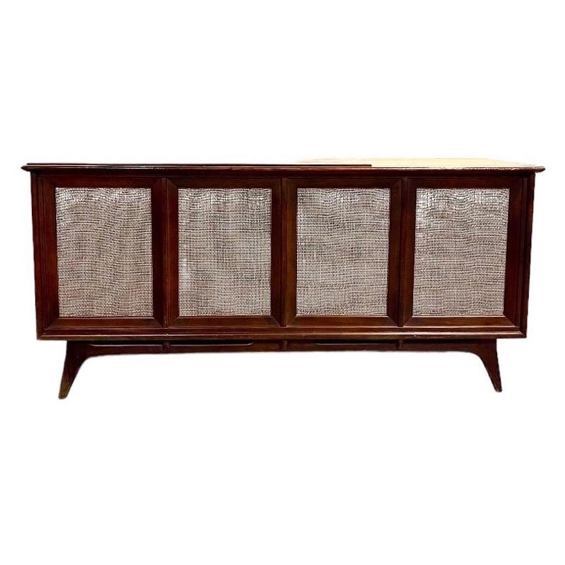 “If art decorates space… and music is the art that decorates time, then our vintage stereo consoles decorate lives by accentuating both.”

This console:
This is a console refurbished by us.  We acquire our pieces from very reliable, established, and